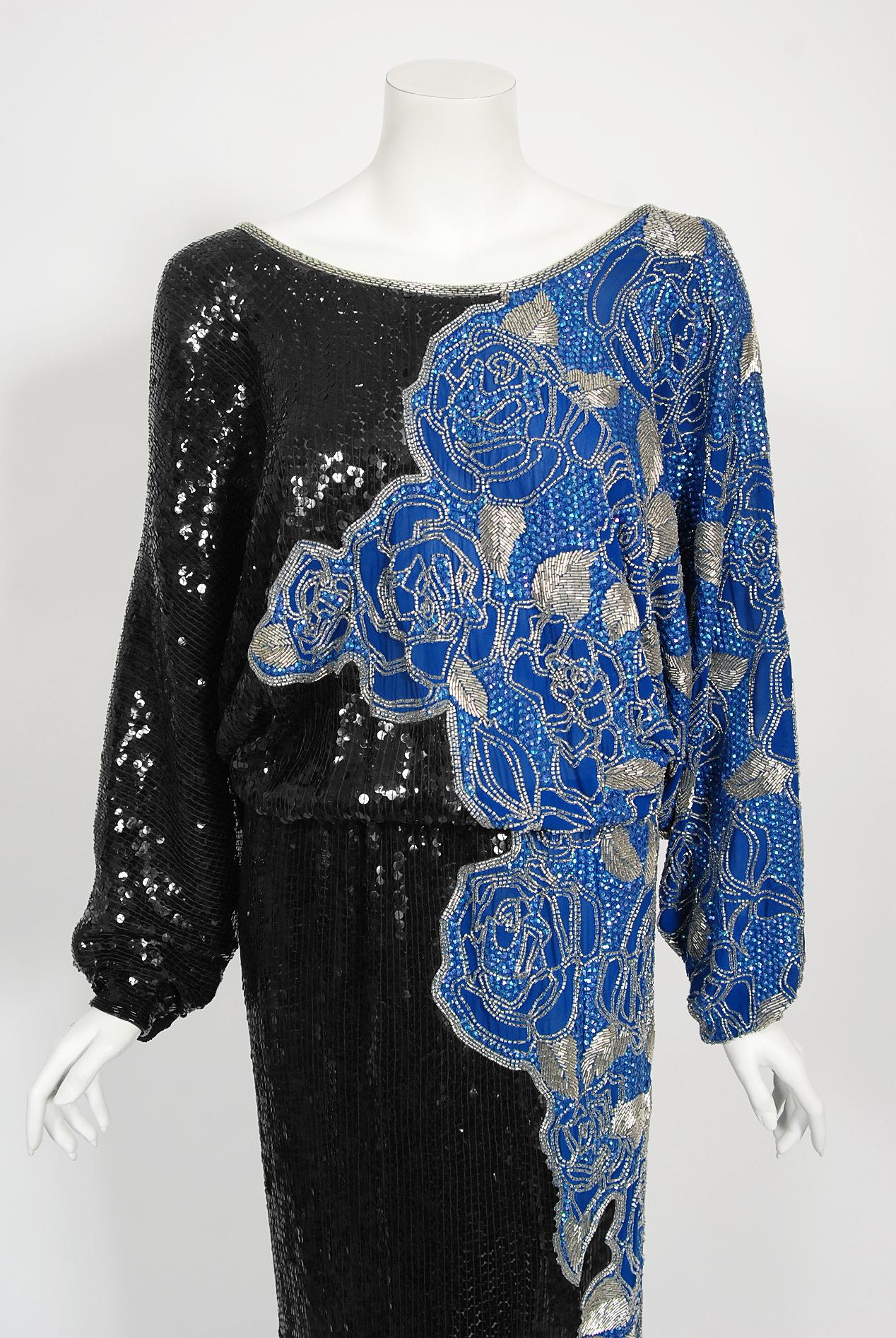 An absolutely gorgeous and totally timeless Halston couture fully-beaded black and blue silk gown dating back to the late 1970's. Halston revolutionized the way women dress and is one of the few designers, alongside Claire McCardell and Norman