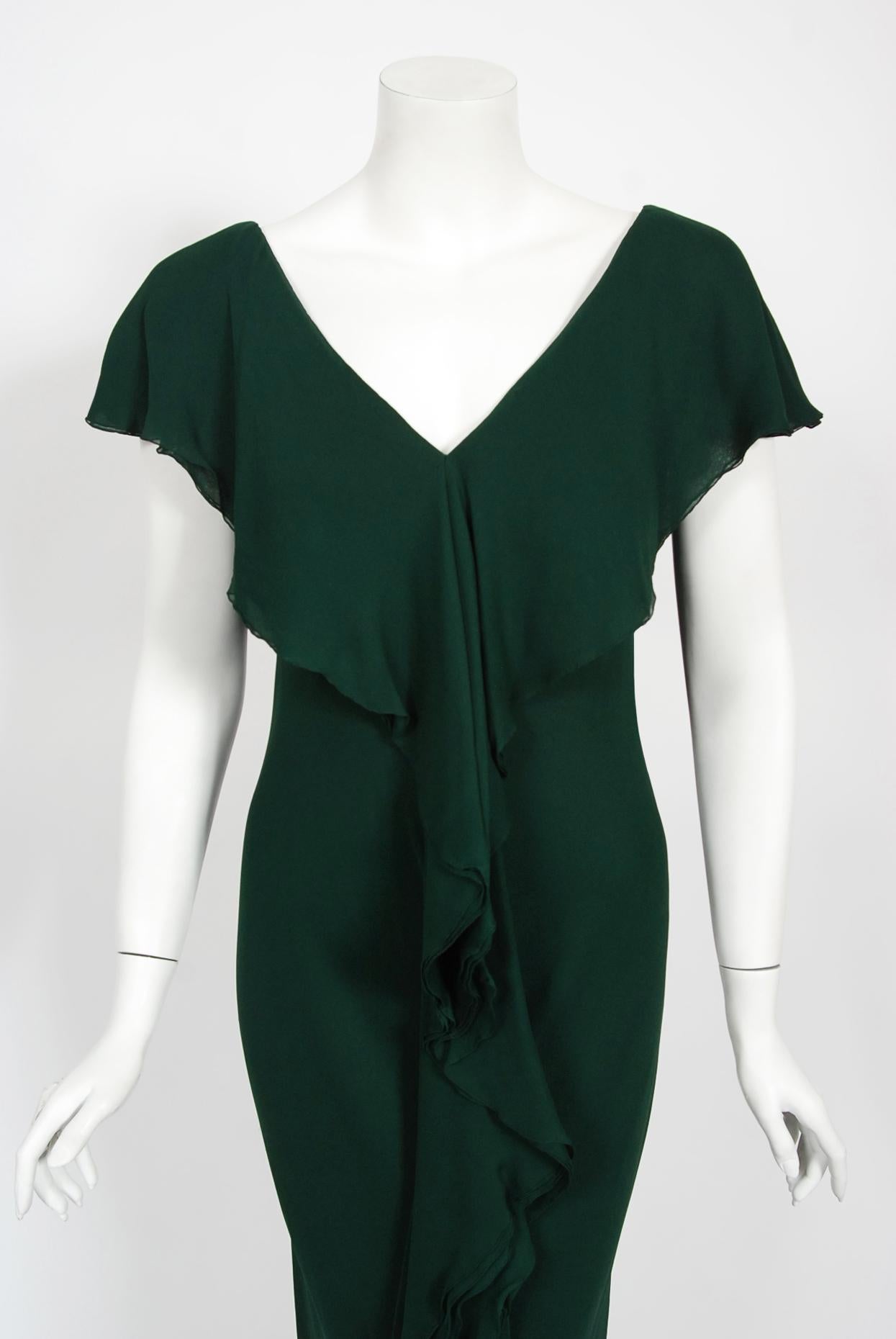 An absolutely gorgeous Halston couture forest green bias-cut gown dating back to his fall-winter 1975 collection. As shown, the same garment in lime green is archived at the Chicago History Museum. Halston revolutionized the way women dress and is