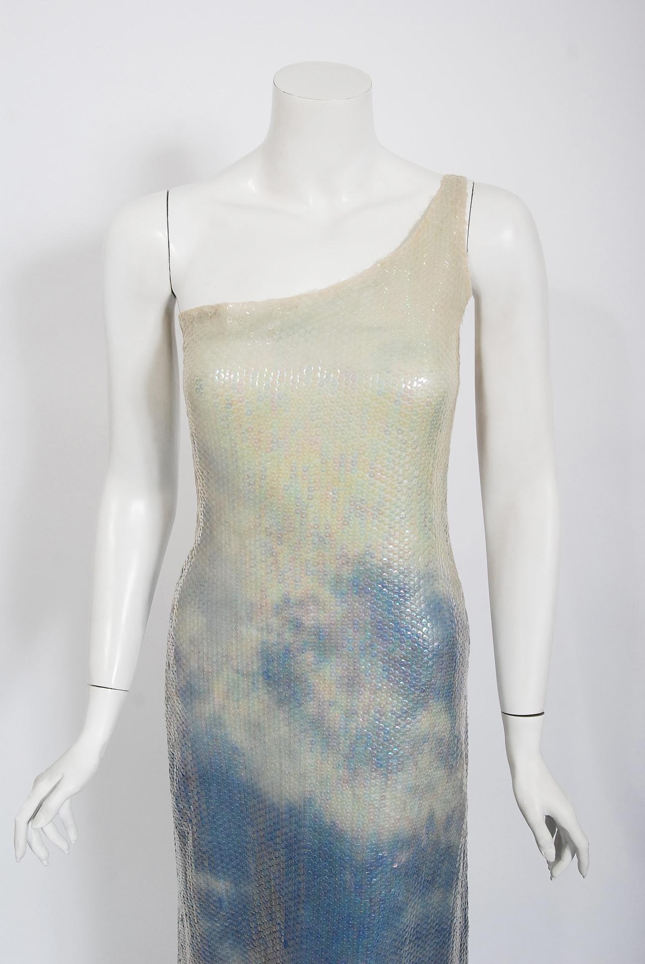 Gorgeous and rare Halston designer sequin silk hourglass gown dating back to 1972. Halston's handpainted series from the early 1970's was produced by famed textile house Up Tied. Up Tied was an American textile house specialising in tie-dyed fabrics
