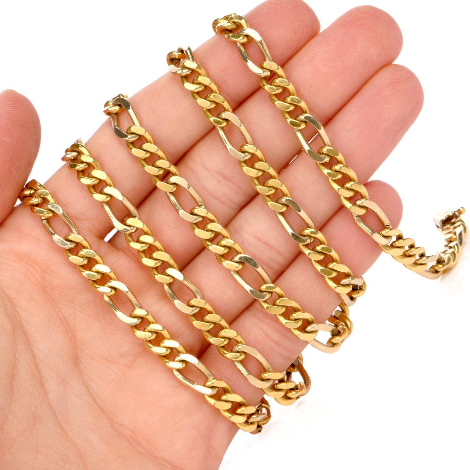 This long figaro chain necklace is crafted in solid 18 karat yellow gold. Composed of a figaro link pattern, measuring 32 inchese long. The chain length offers the versatility of wearing it as single strand, a double strand and/or attaching a