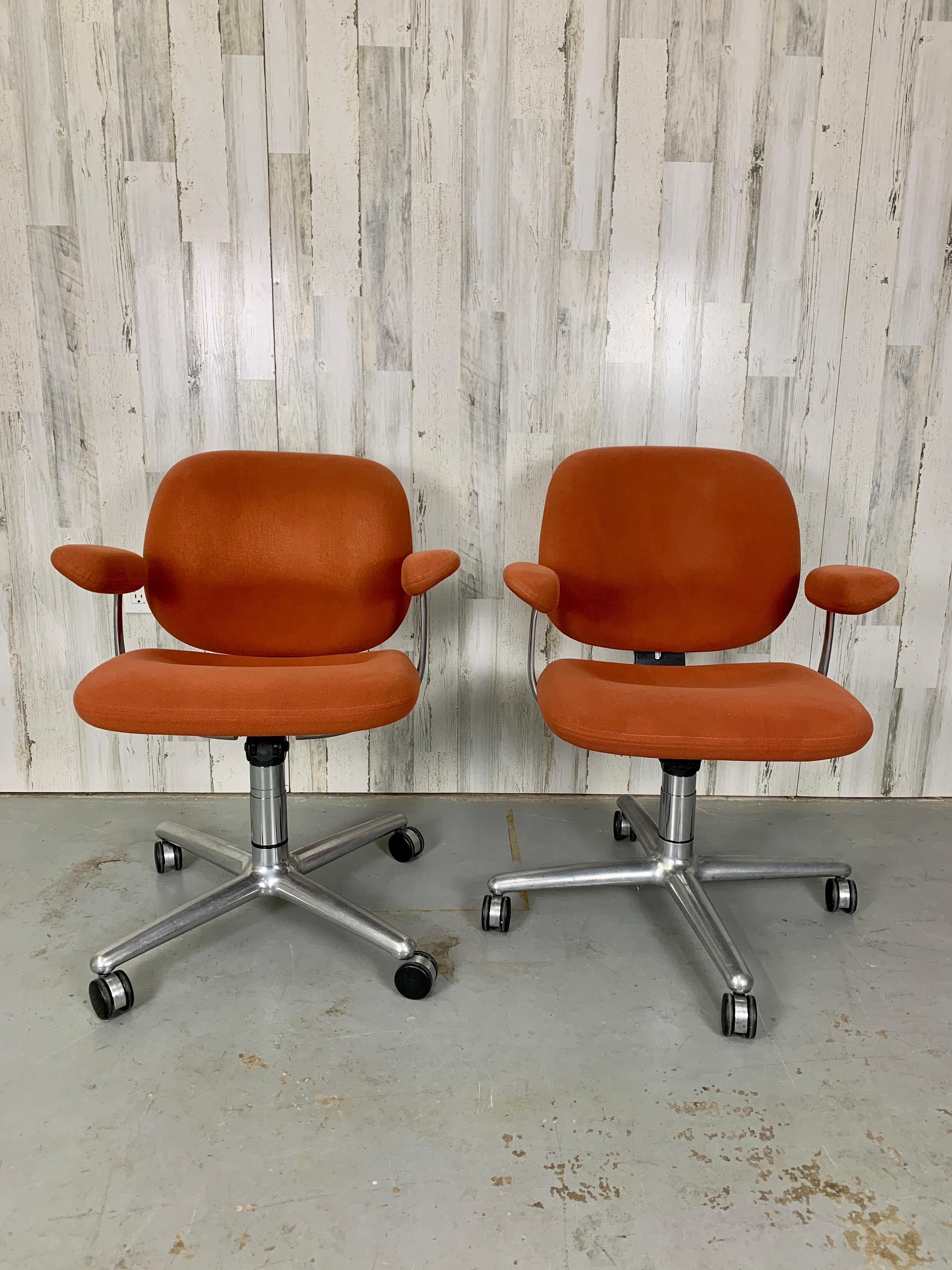 Herman miller swivel aluminum four prong base with Coral colored original fabric.