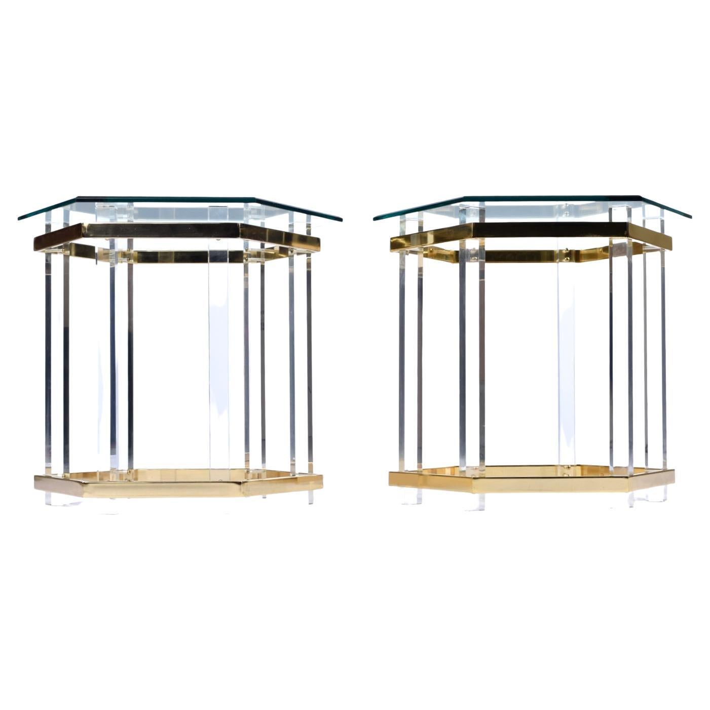 Vintage 1980s Charles Hollis Jones style Lucite and brass end tables with beveled hexagon glass top. The geometric beveled glass top creates a silhouette mimicking the dynamic angles and form of the table base. Vertical acrylic architectural pillars