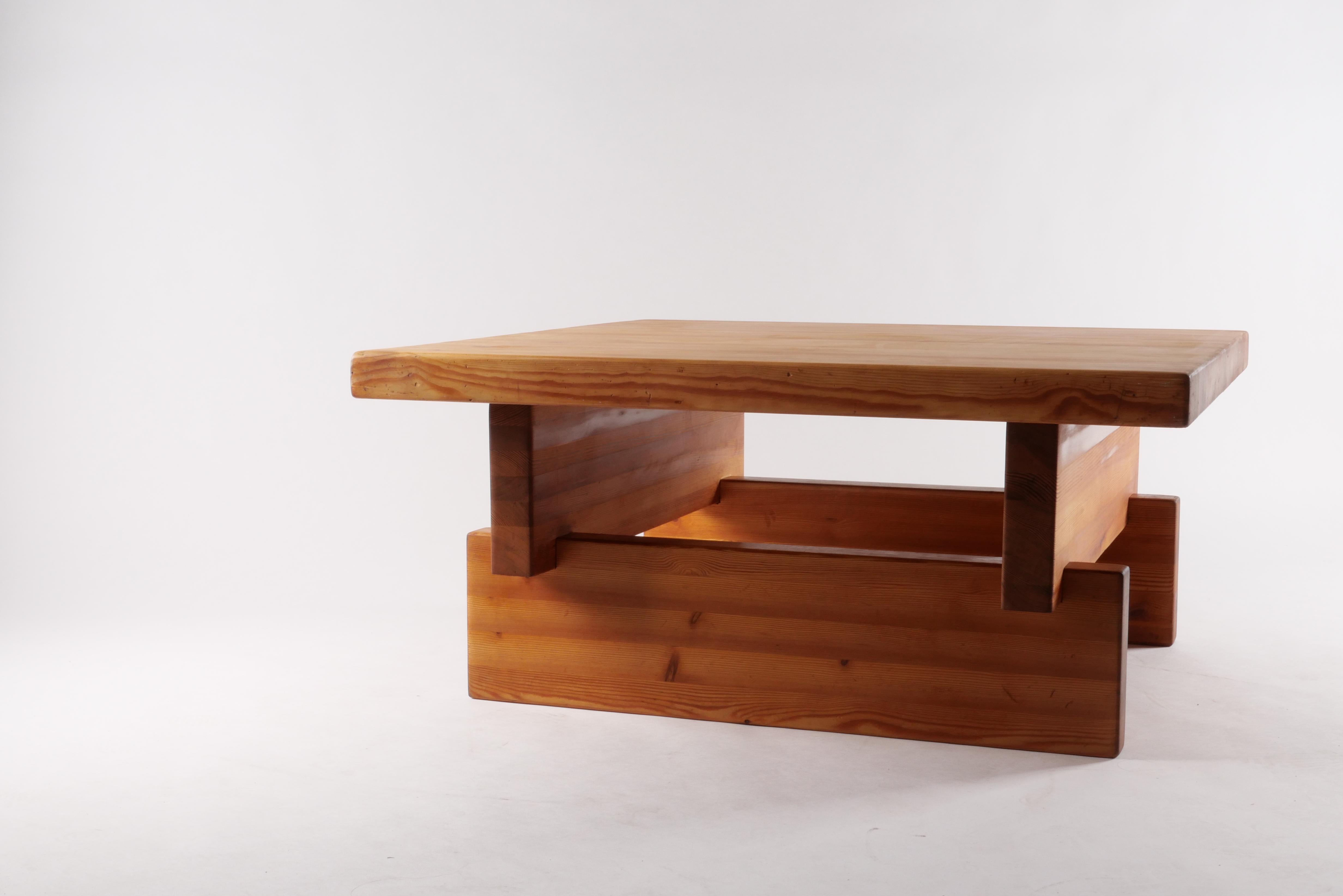 The table everyone wants! Solid Pine shapes each 2” thick are stacked to create an interlocking base structure. The substantial square top provides ample space to set a couple of drinks and a few stacks of art books. Put your feet up on it too! 