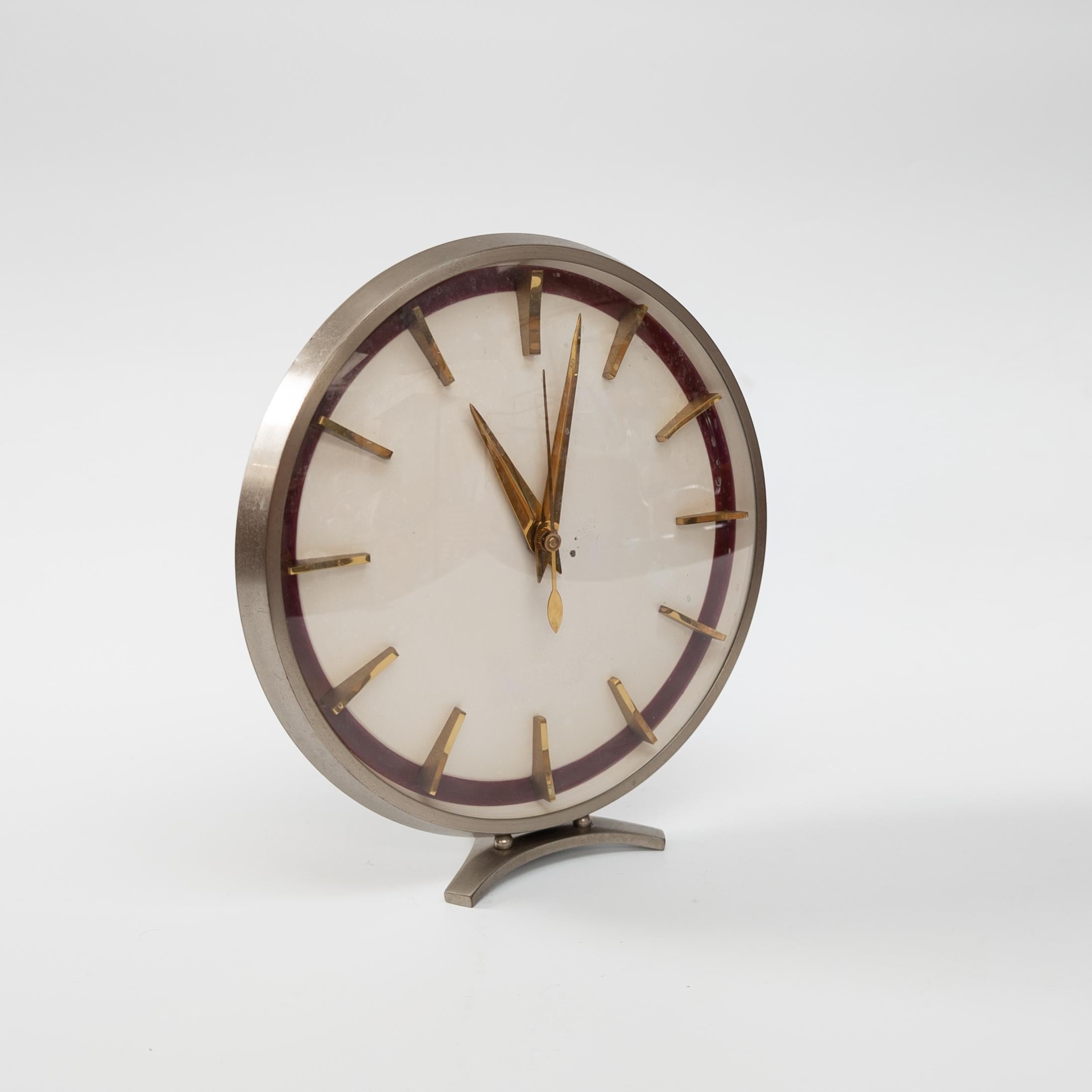 Beautiful timepiece from famous German clock manufacturer KIENZLE, founded in 1822. In a very nice original condition with one small dot on the enamel paint on the dial. Fully operational. Works on standard AA LR-6 battery. Signed with 