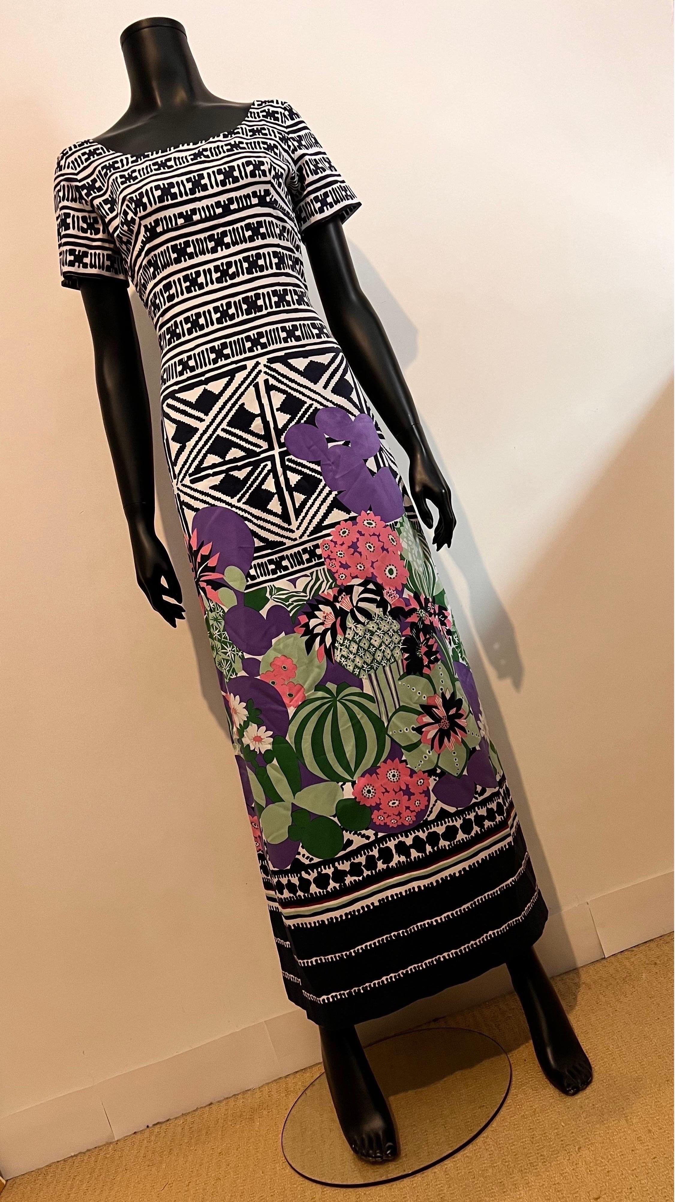 Magnifique exemple de robe d'été vintage à motifs abstraits/floraux de Lanvin Boutique des années 1970.

Une robe ravissante pour une fête de printemps/été ou pour un moment spécial en station balnéaire, avec des manches courtes et un décolleté