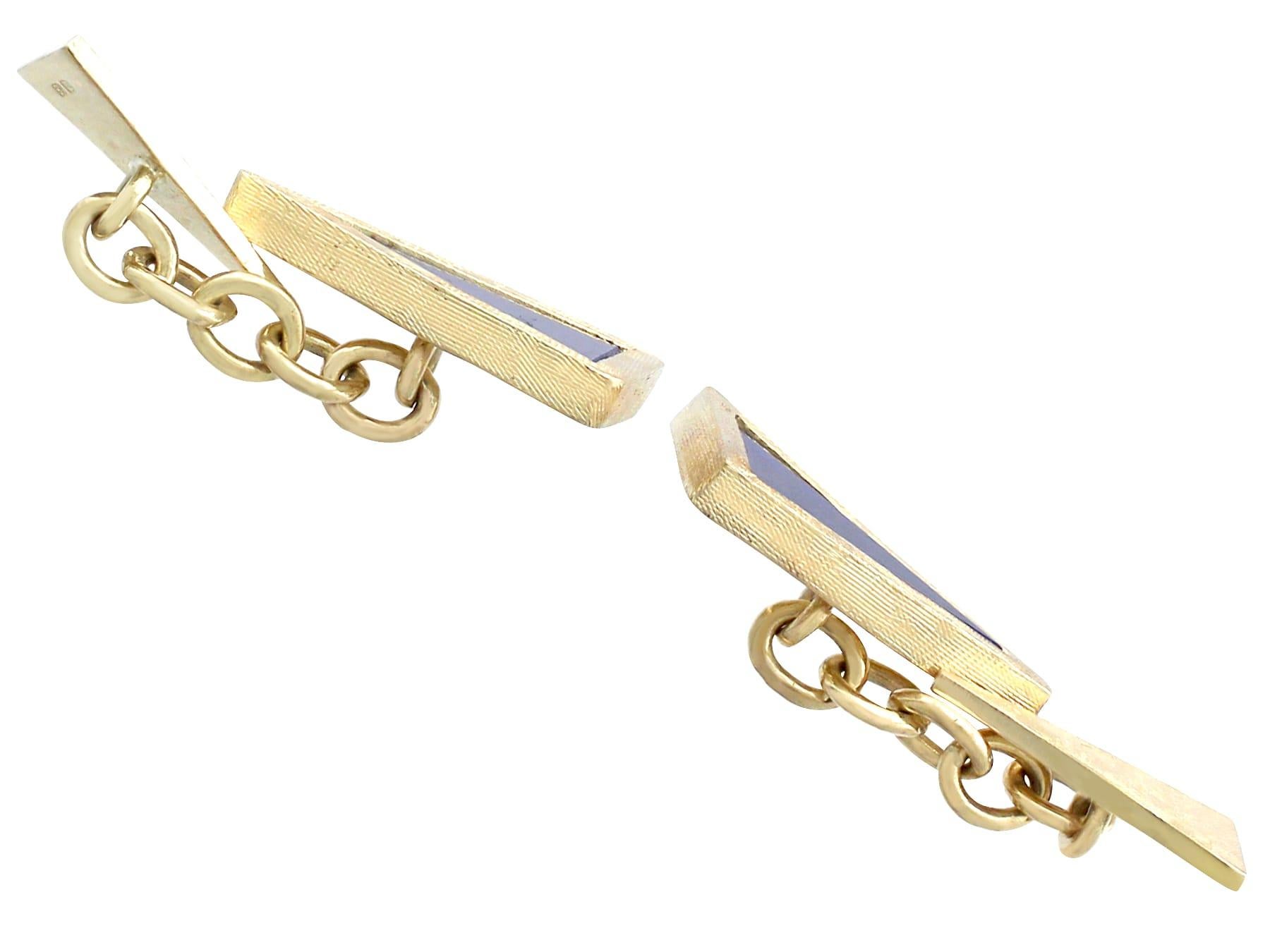 An impressive pair of vintage English lapis lazuli and 18 karat yellow gold cufflinks; part of our diverse men's jewelry collections.

These fine and impressive vintage lapis lazuli cufflinks have been crafted in 18k yellow gold.

The links have a