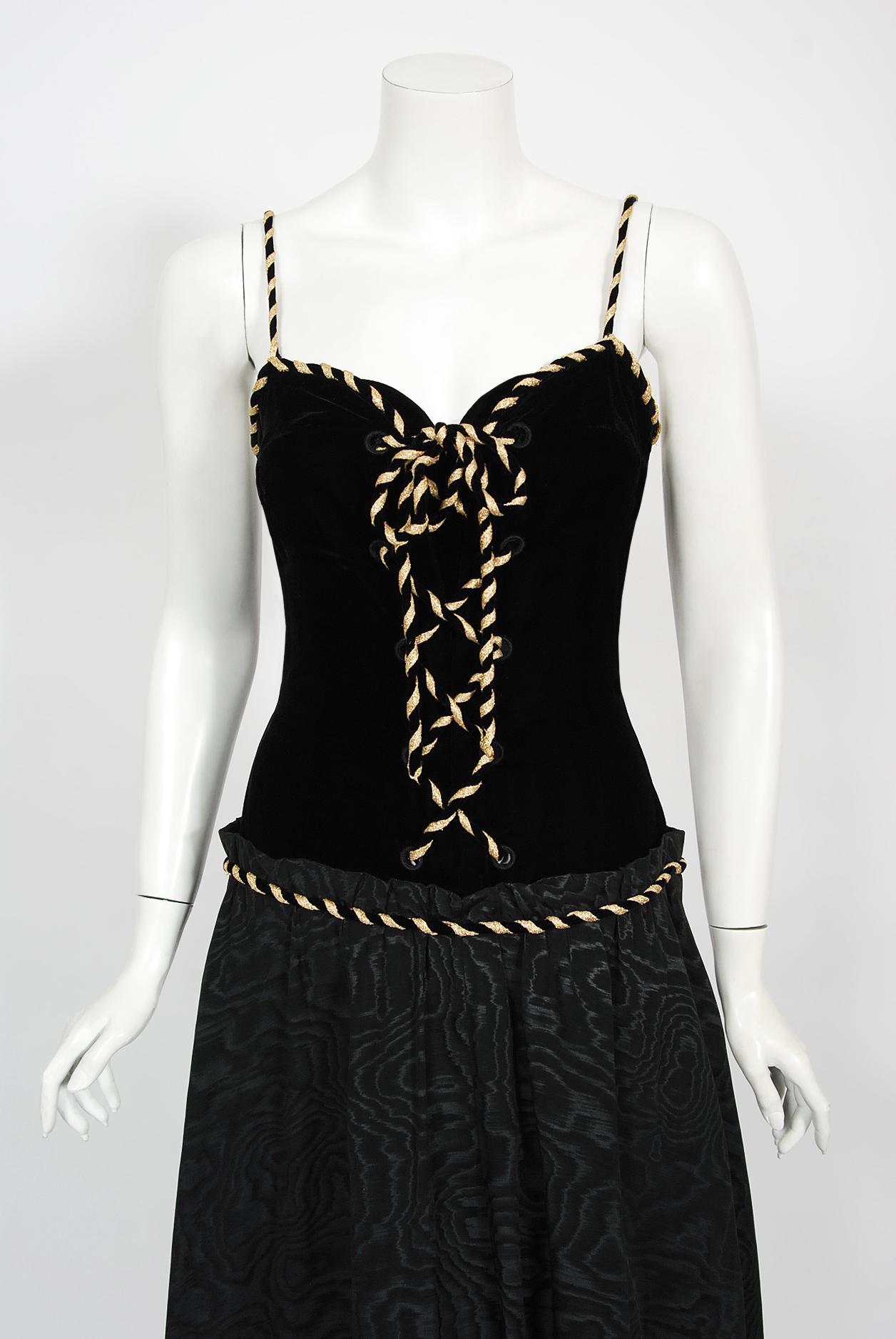 A seductive Loris Azzaro silk moiré and velvet low plunge lace-up corset gown dating back to the late 1970's. Loris Azzaro is famous for creating glamorous and provocative customized looks for celebrity elite. His timeless designs were favorites to