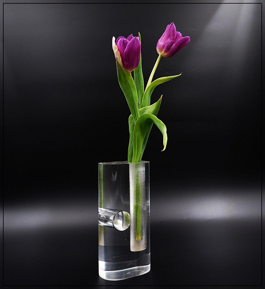 Vintage 1970s Lucite Soliflor Vase
Space Age design - Modern decoration
Measures : 10cmx6cm H:20cm
Material : Lucite 
Wear consistent with age and use
Ronson lighter sold separately