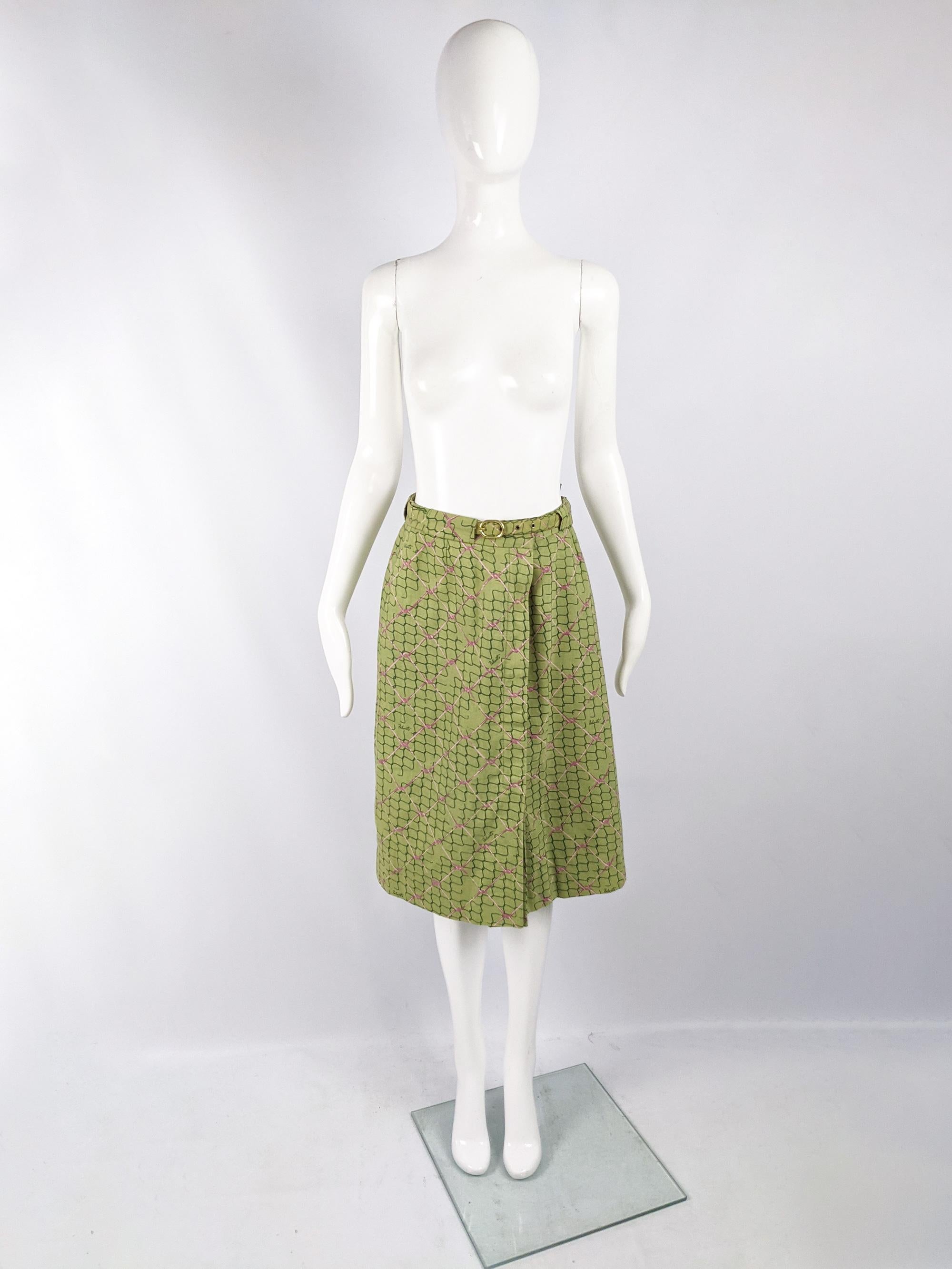 An amazing vintage womens skirt from the 70s by quality Italian label, Luisa Frassine using Ken Scott's Falconetto fabric. In a green cotton Falconetto fabric with an incredible, unique print of a pink and dark green wire fence with 'Falconetto'