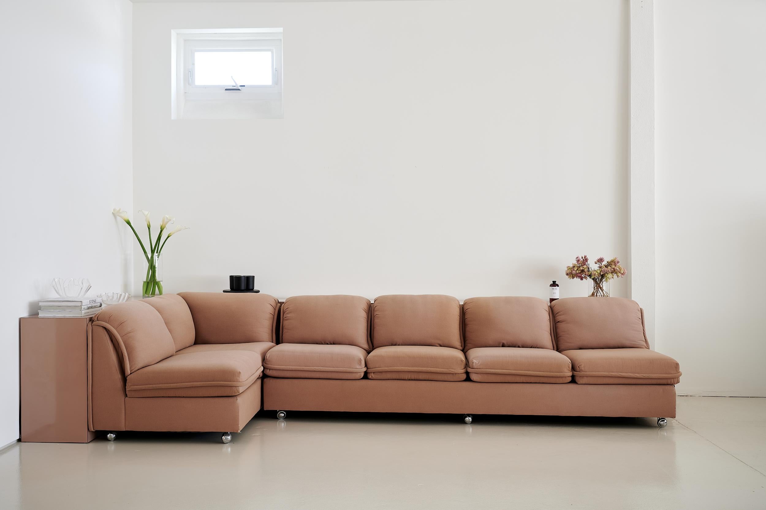 Post Modern style armless sofa sectional manufactured in the USA by Classic Gallery

Sourced from the original, single owner.

Upholstered in sumptuous mauve wool.

Chrome casters.

Two pieces: an armless four-seater and a left-hand