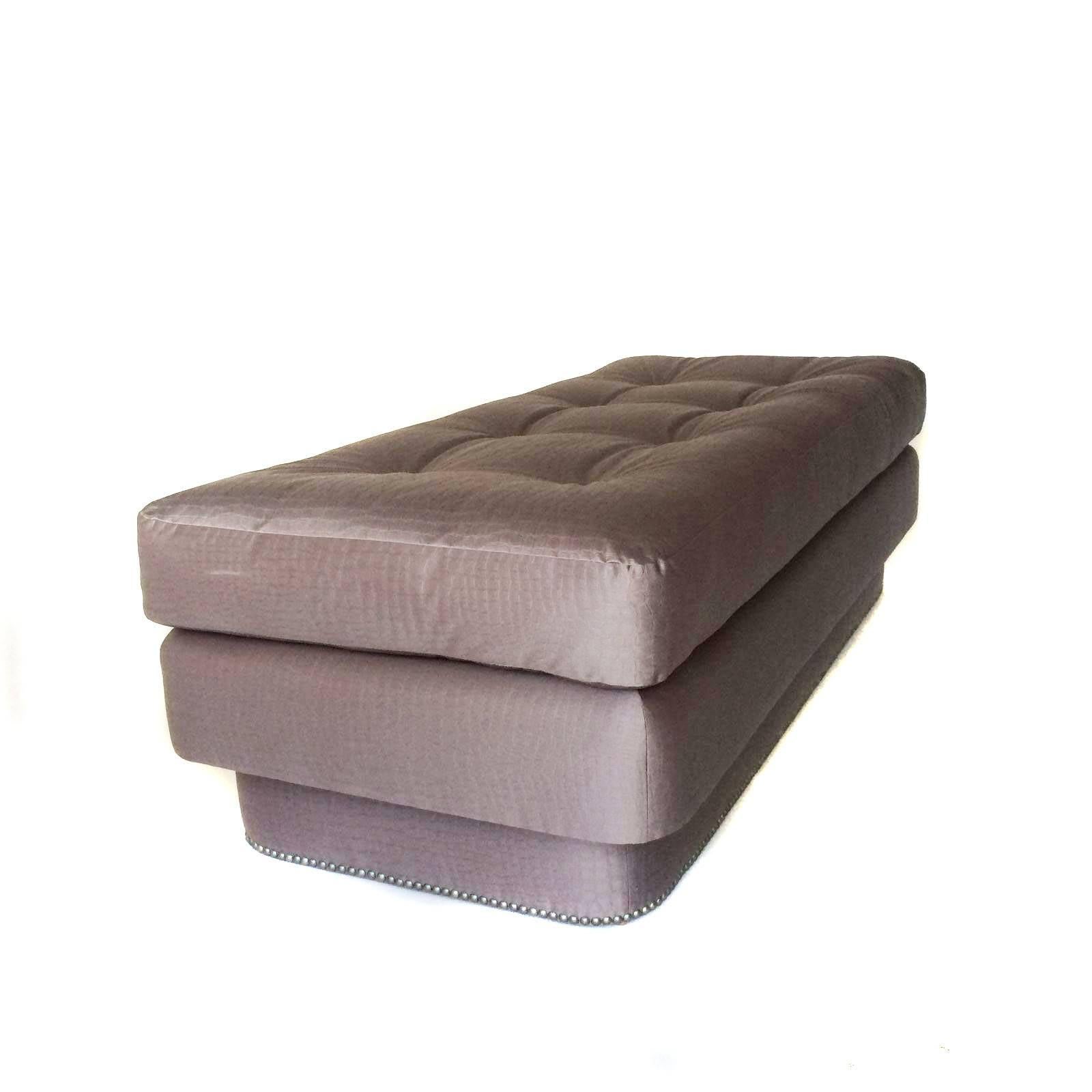 This beautiful, glamorous 1970s ottoman or bench has been upholstered in a contemporary faux shimmering croc fabric complete with pewter nailheads. What a versatile piece! It can serve as a coffee table, a bench at the end of an elegant bed or a