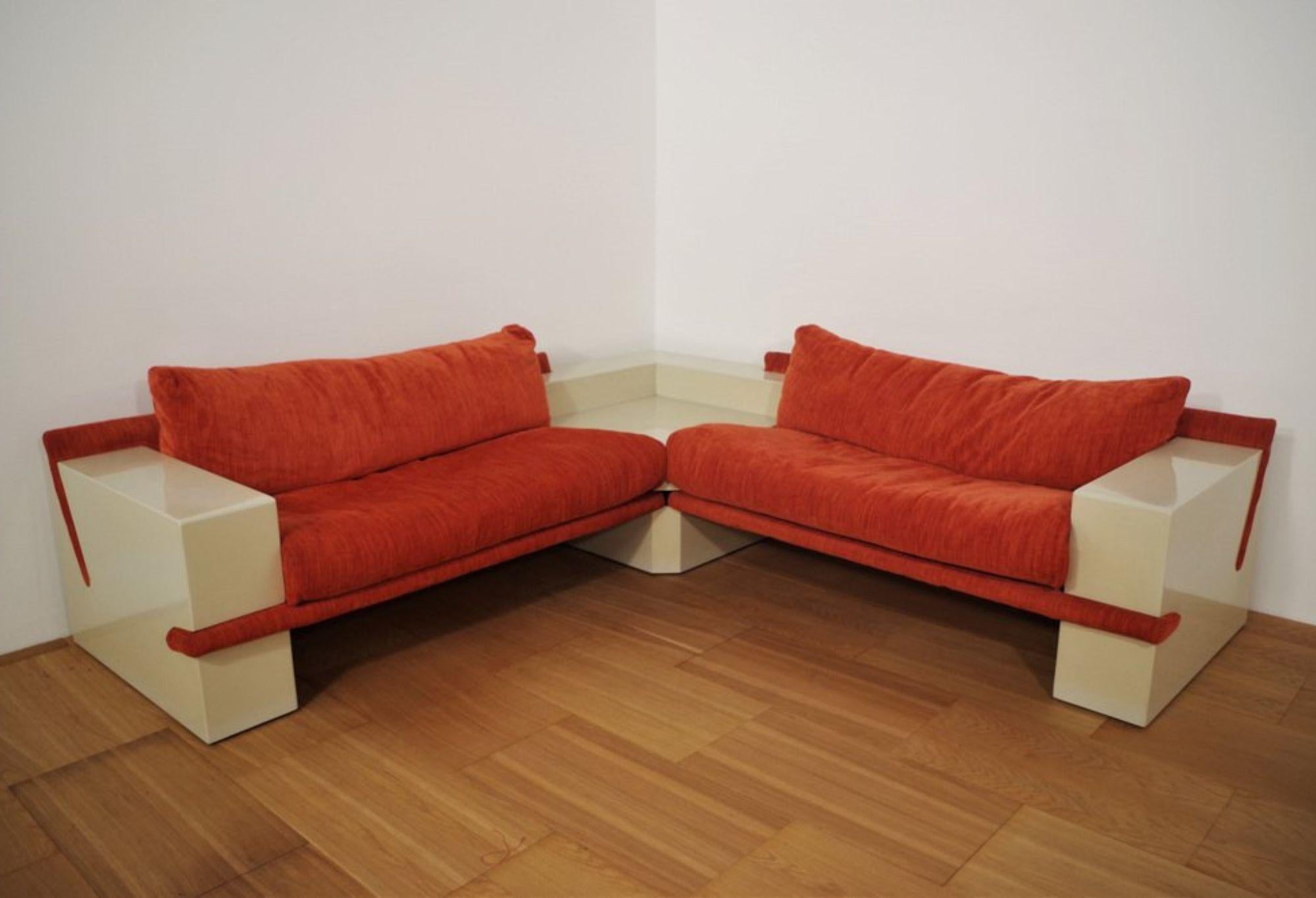 Vintage 1970s Modular Sofa - White Lacquered Frame & Orange Fabric

A striking 1970s modular sofa, this piece combines a sleek white lacquered frame with bold orange fabric upholstery, embodying the retro-futuristic aesthetic of the