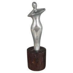 Scultura di donna stilizzata in metallo nichelato vintage degli anni '70 -1Y87