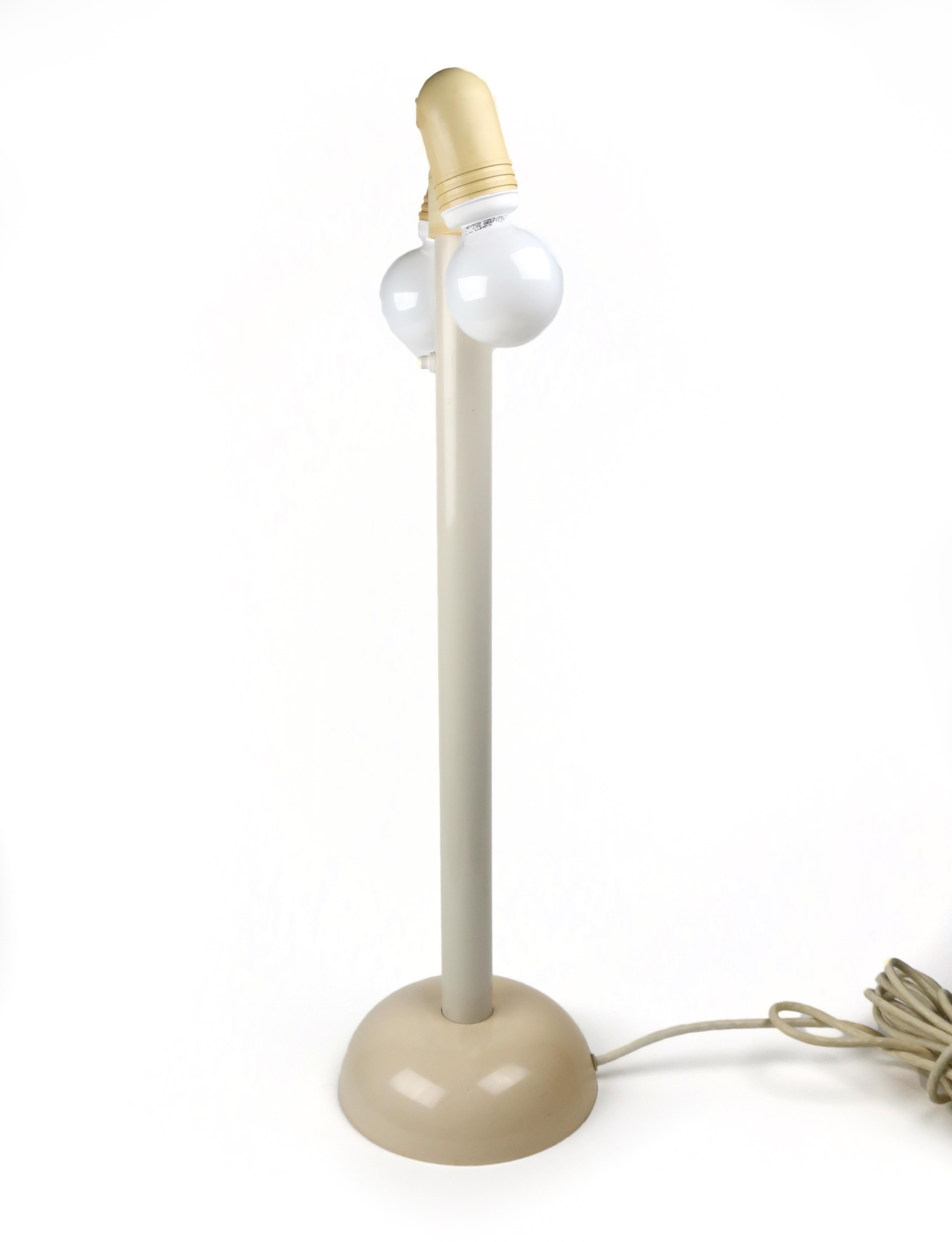 A great vintage table lamp designed for outdoor use but that also looks good inside In good vintage condition with a few marks on the base, but looks great and works perfectly, especially with a pair of globe bulbs. Marked: Olympia Lighting