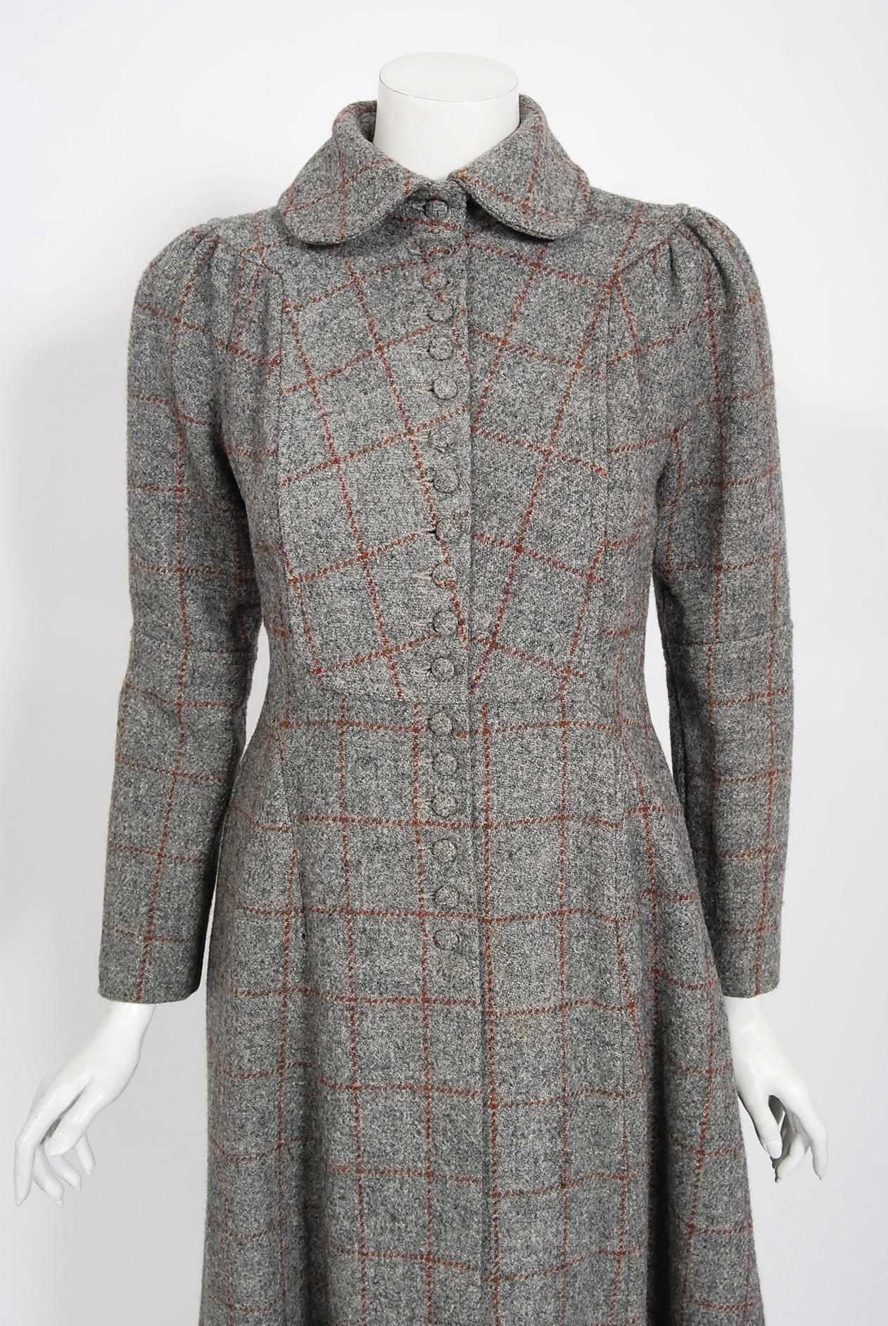 Stunning and totally timeless Ossie Clark gray and red plaid wool dress coat dating back to his 1970 couture collection. English fashion designer, Raymond 
