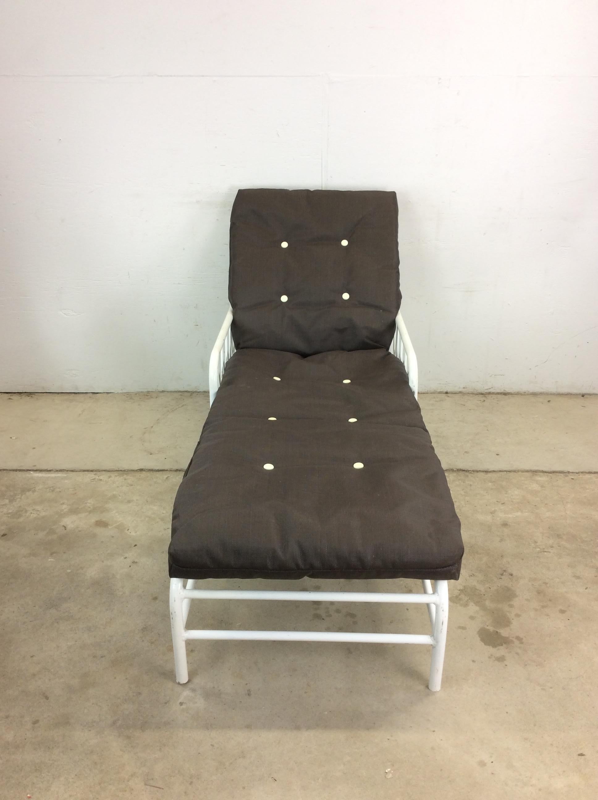 This vintage patio lounge chair features white painted aluminum frame, reclining seat back, rubberized seat supports, and vintage tufted cushion.   Matching recliner, set of 3 chairs, end tables, rocking chair, ottoman, and cocktail table available