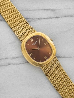 Vintage 1970s Patek Philippe Ellipse 3589/1 18K YG Brown Sunburst Dial Auto 33mm