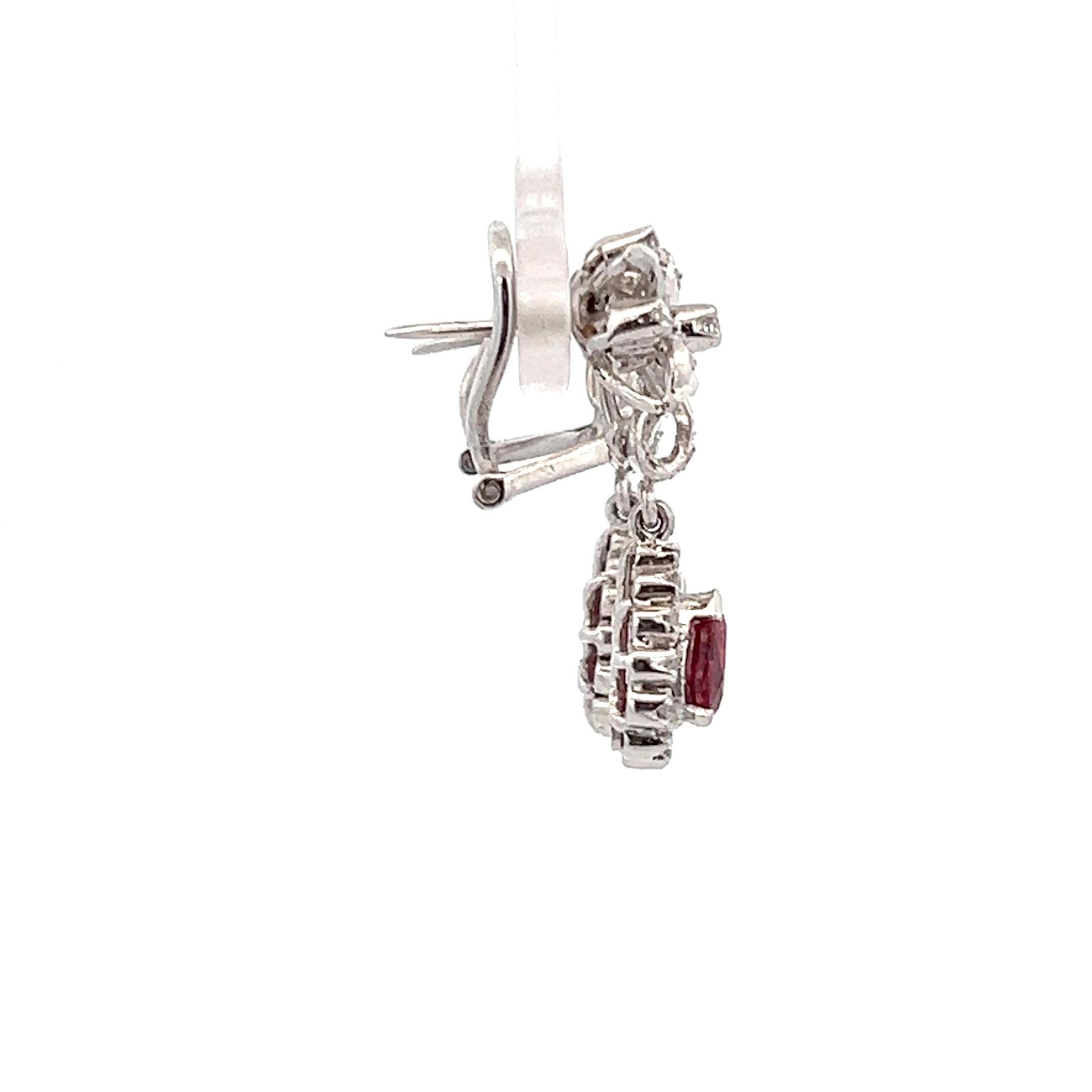 Contemporary Vintage 1970s Pear Ruby and Diamond White Gold Dangle Omega Back Earrings For Sale