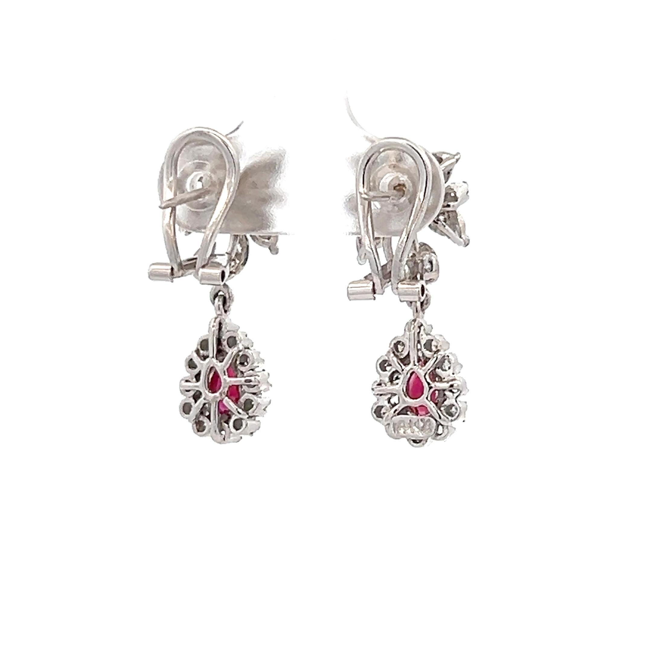 Pear Cut Vintage 1970s Pear Ruby and Diamond White Gold Dangle Omega Back Earrings For Sale