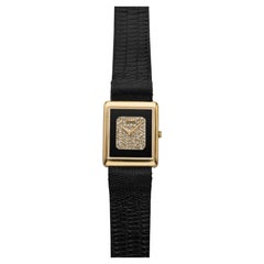 Piaget Protocole 9150 de los años 70, de oro amarillo de 18 quilates, con esfera de ónix y pavé de diamantes, cuerda manual, 23 mm