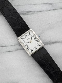 Vintage 1970s Piaget Tank 9297 18K WG Manual White Roman Dial 24mm
