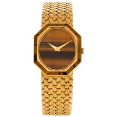 Piaget Montre vintage octogonale en or jaune 18 carats avec œil de tigre pour femme 9342, années 1970