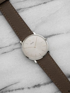 Vintage 1970s Piaget Ultra Thin 912 18K WG Silver Sunburst Dial Manual 32 mm