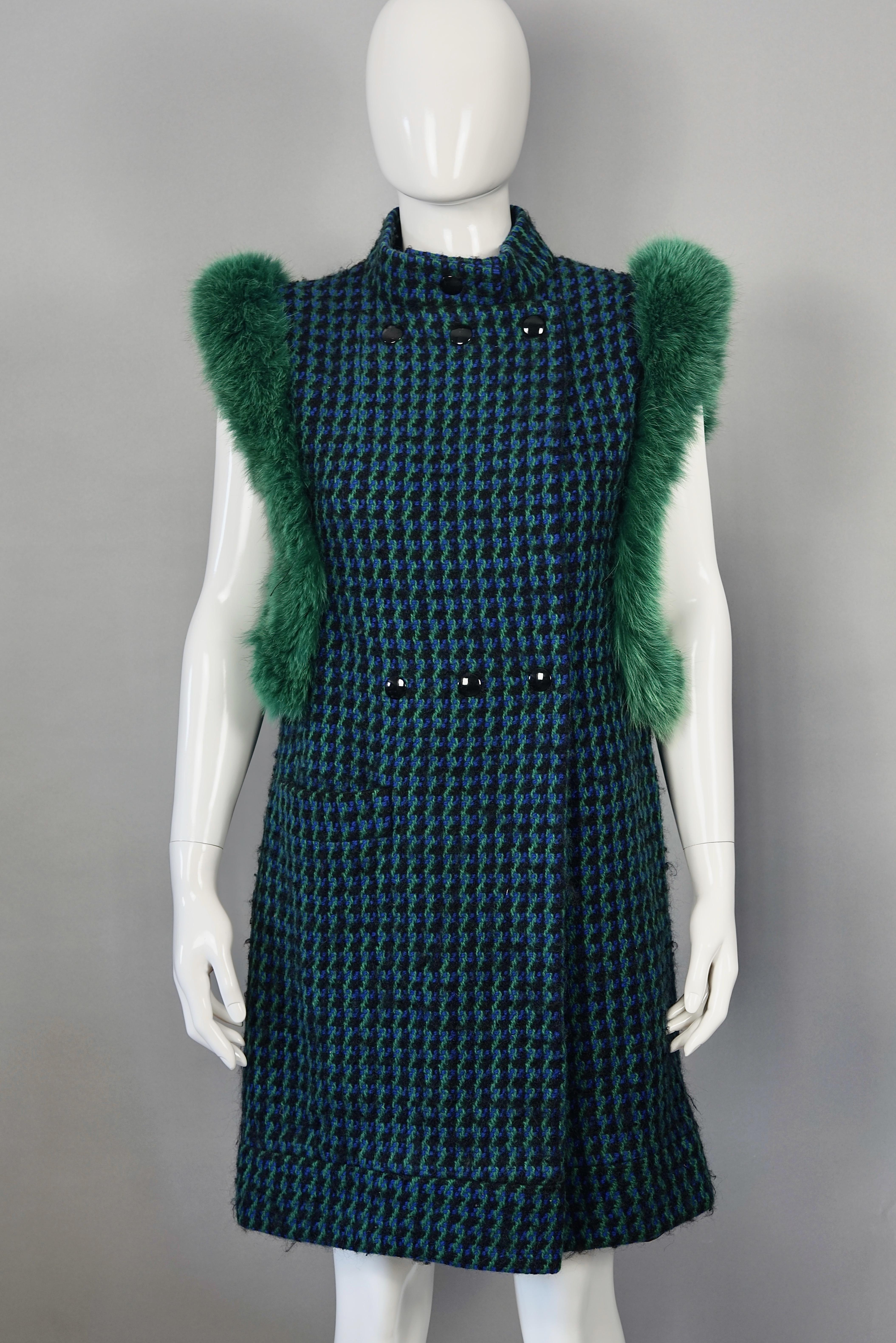 Vintage 1970s PIERRE CARDIN Mod Knitted Fur Vest Coat

Measurements taken laid flat, please double bust, waist and hips:
Shoulder: 17.71 inches (45 cm)
Bust: 19.68 inches (50 cm)
Waist: 19.29 inches (49 cm)
Hips: 20.47 inches (52 cm)
Length: 36.22