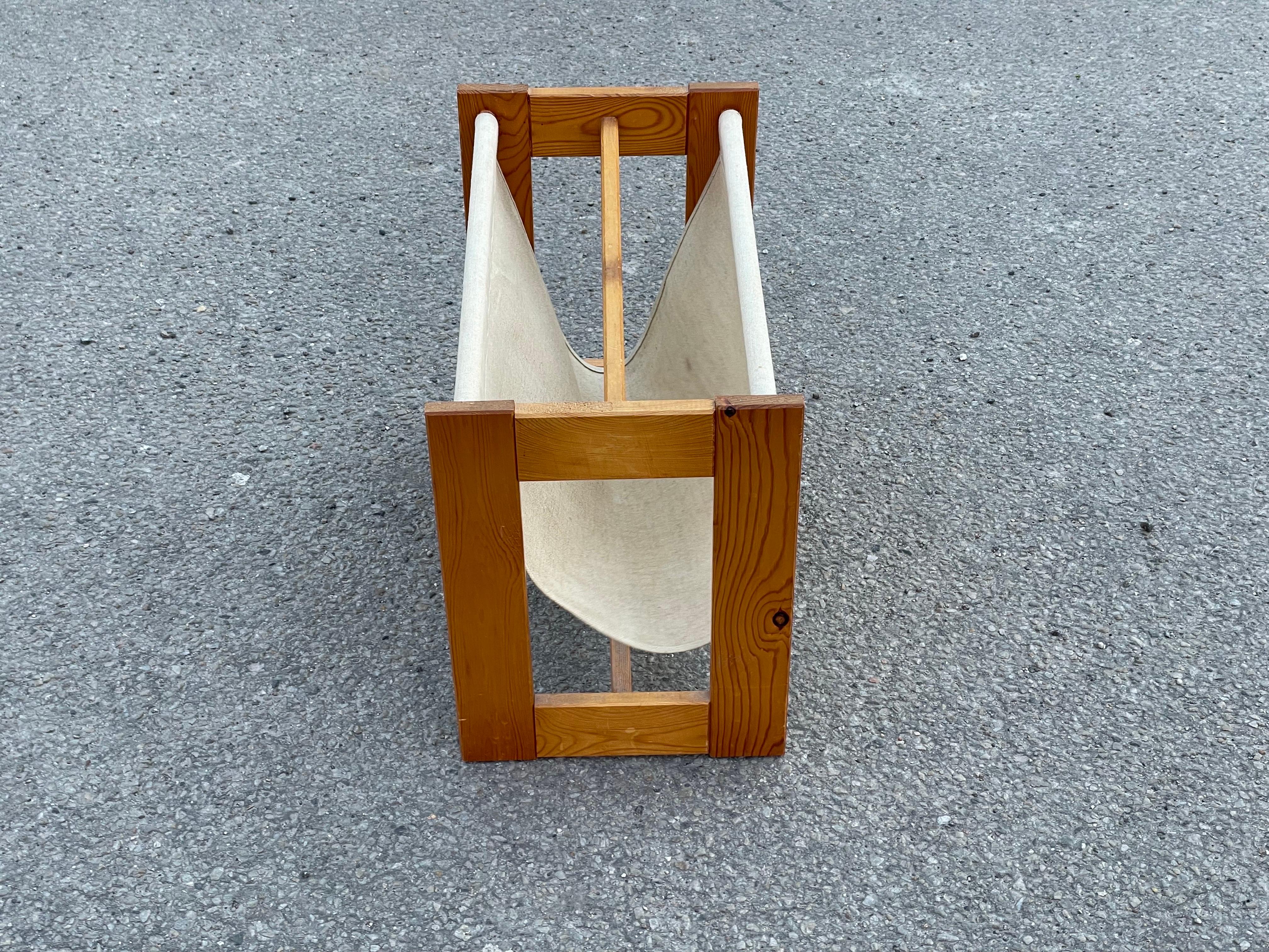 Scandinavian midcentury magazine rack in rustic pine from 1970´s.