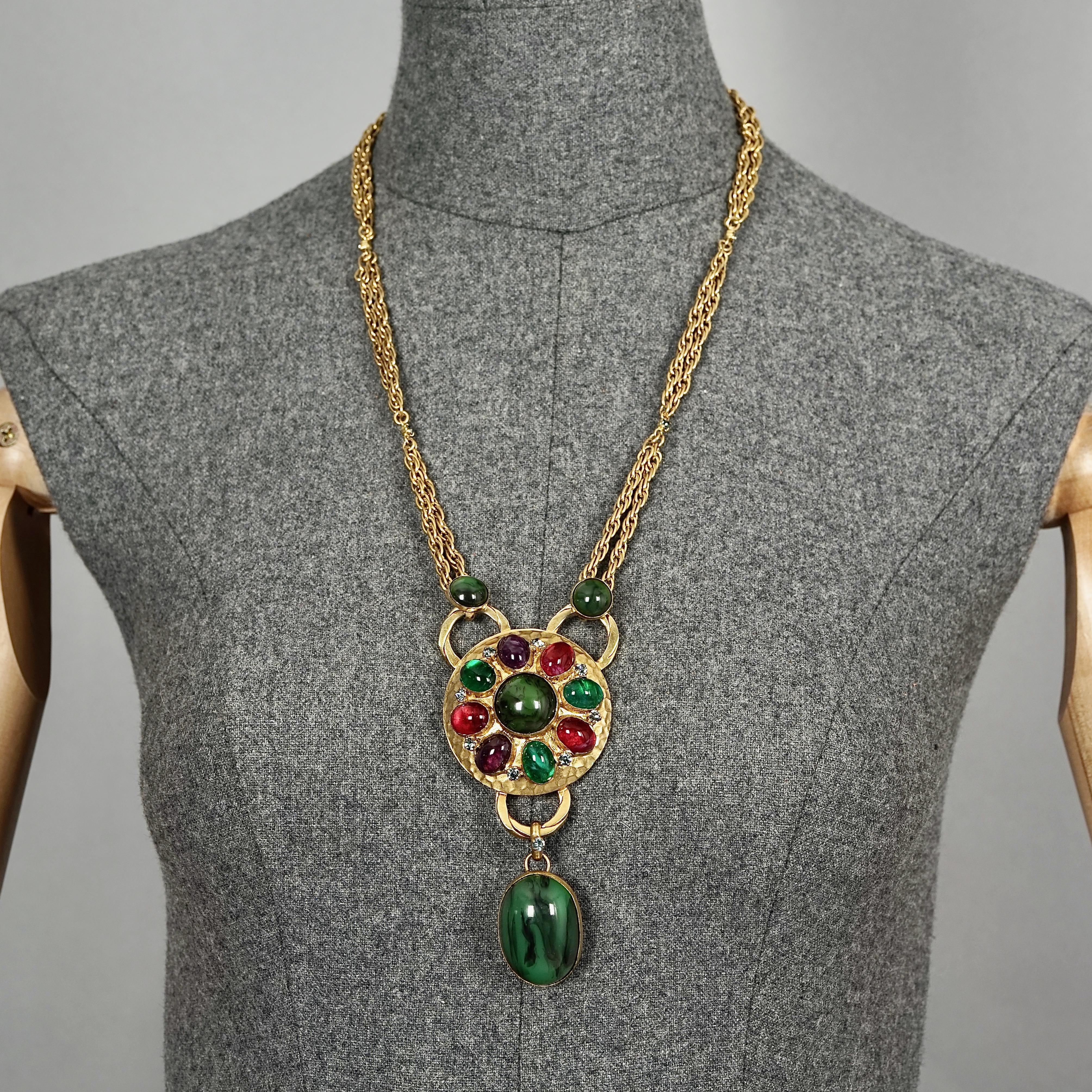 Vintage 1970s ROGER SCEMAMA Jeweled Glass Cabochons Medallion Necklace

Measurements:
Height: 4.33 inches (11 cm)
Wearable Length: 23.22 inches (59 cm)

Features:
- 100% Authentic ROGER SCEMAMA.
- Jeweled medallion with colored glass cabochons and
