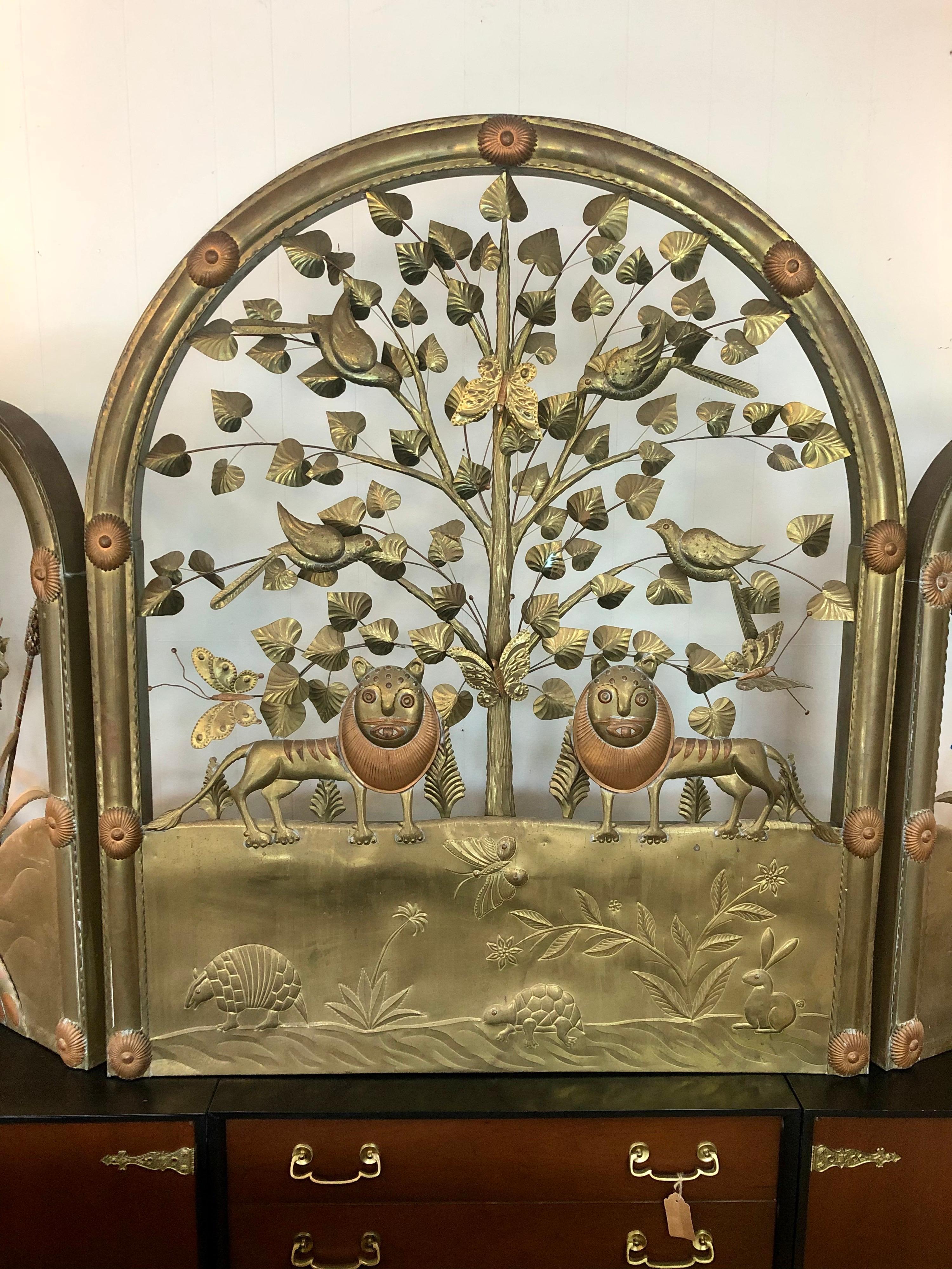 Designed by Sergio Bustamante, this folding screen is in overall good condition. Made of brass and copper. Animal motif throughout. One giraffe missing an ossicone (See Photos). 
circa 1970s. Mexico.
Dimensions:
84