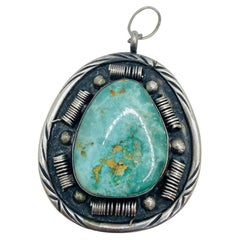 Pendentif vintage amérindien turquoise argenté des années 1970 signé