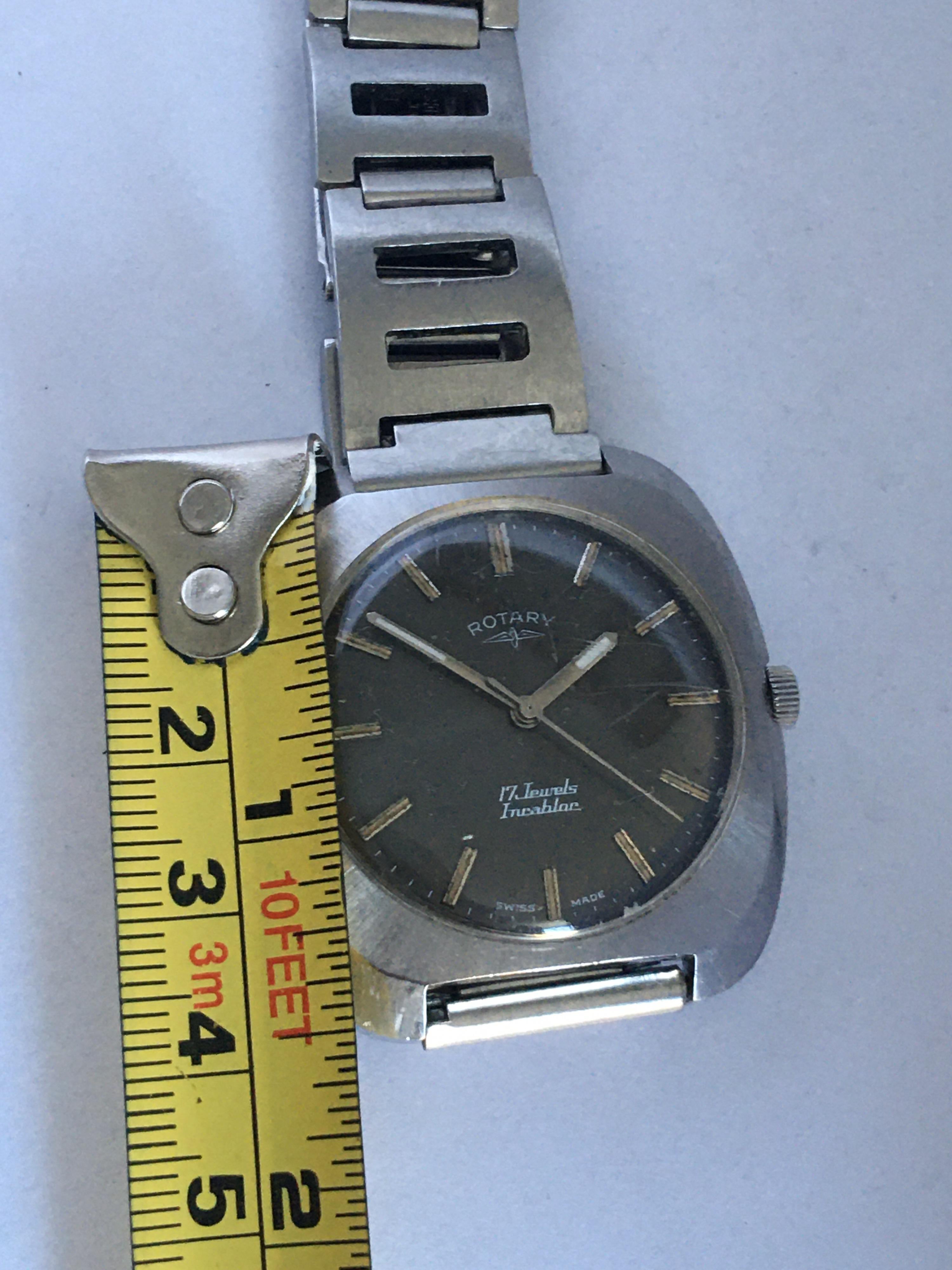 Vintage 1970s Stainless Steel Mechanical Cushion Shape Rotary Watch For Sale 4