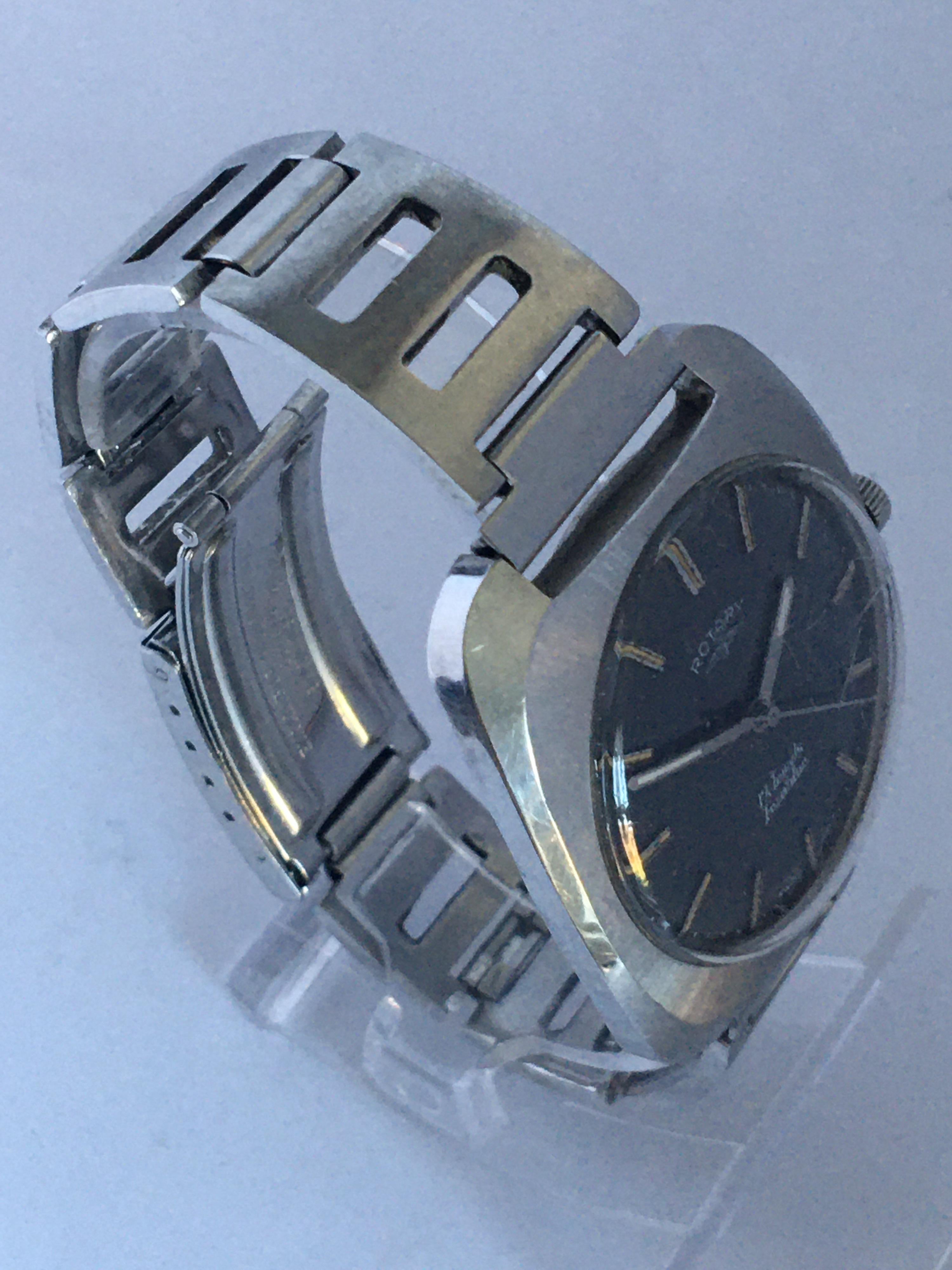 Vintage 1970s Stainless Steel Mechanical Cushion Shape Rotary Watch For Sale 7