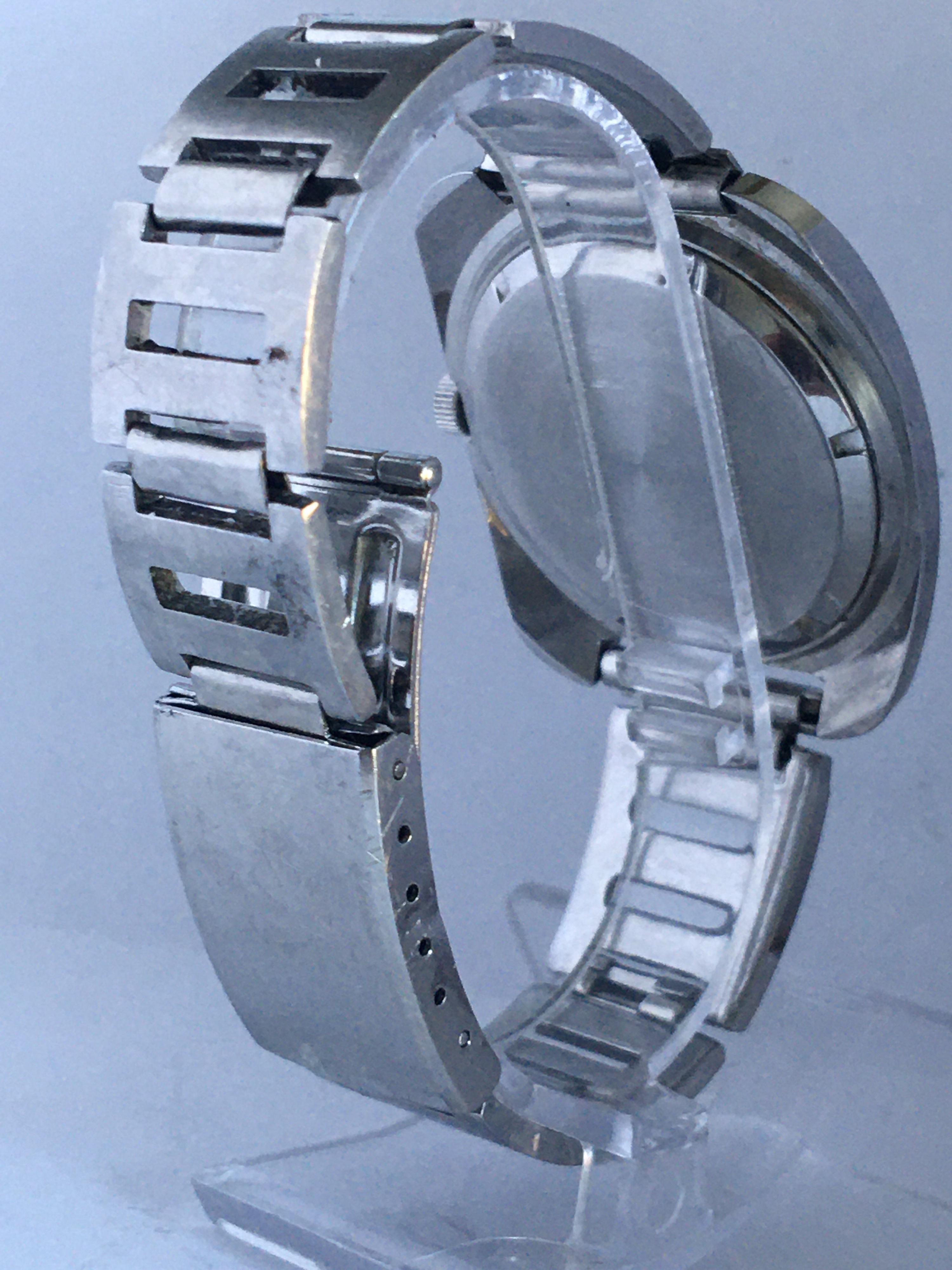 Vintage 1970s Stainless Steel Mechanical Cushion Shape Rotary Watch For Sale 1