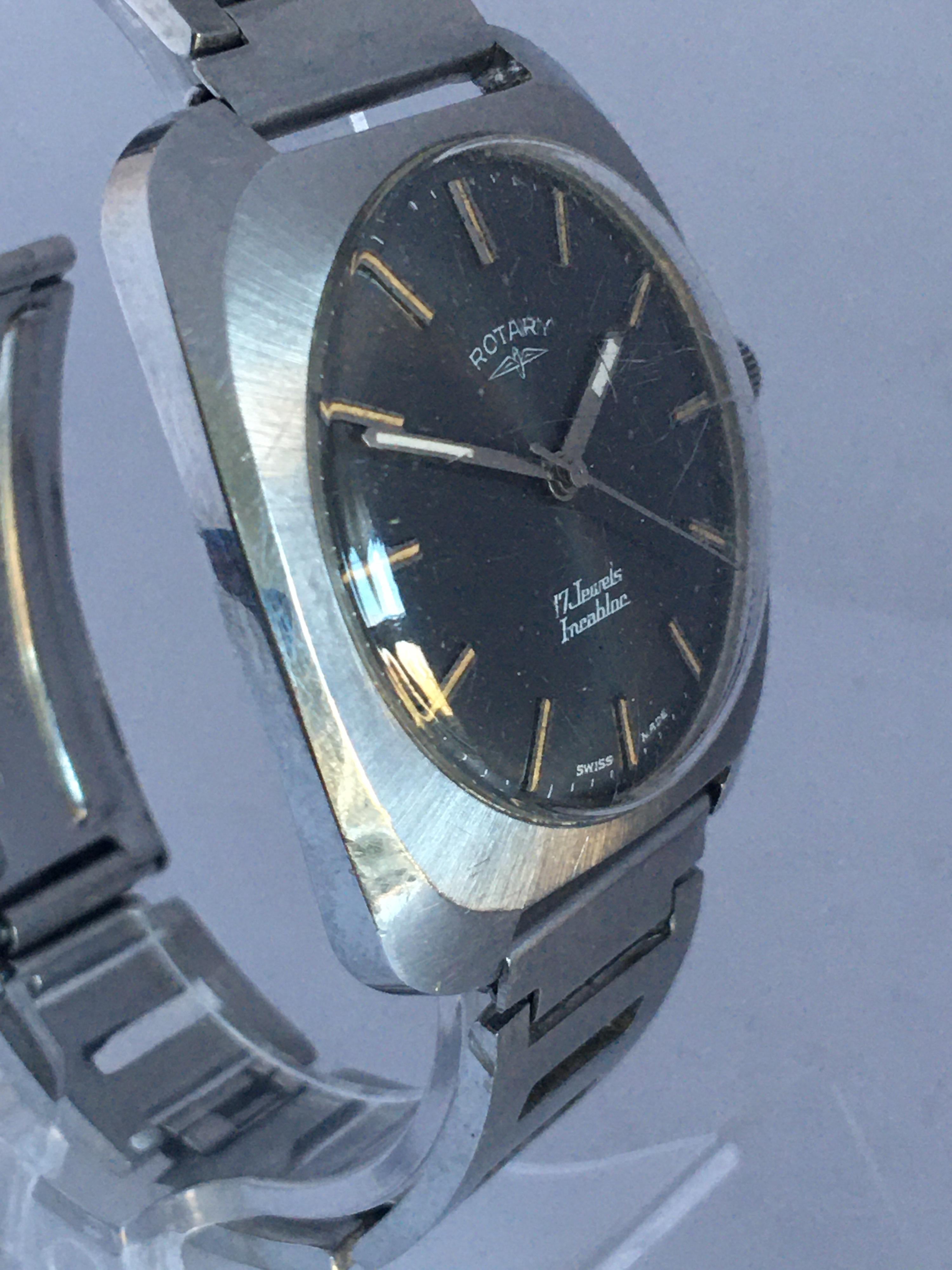 Vintage 1970s Stainless Steel Mechanical Swiss Rotary Watch For Sale 8