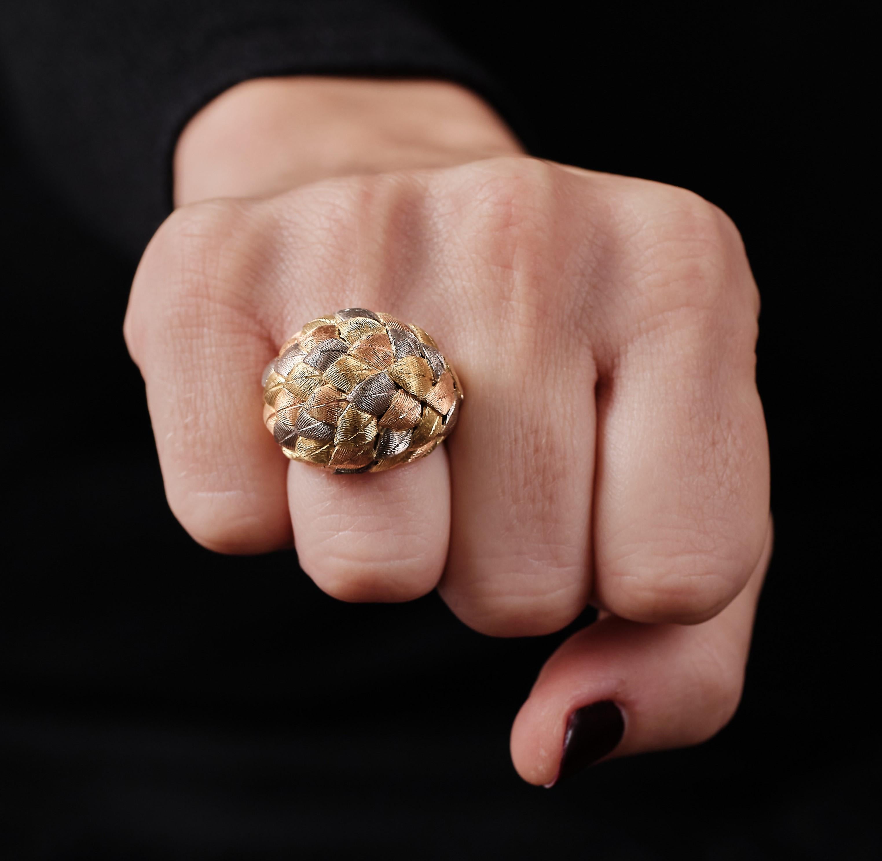 Talk about attention grabbing dress ring. 18kt yellow gold ring with an elegant leaf motif. The surface of the leaves are delicately enhanced with fine line engraving. Giving it a harmonious  and detailed textured surface in alternating gold color.