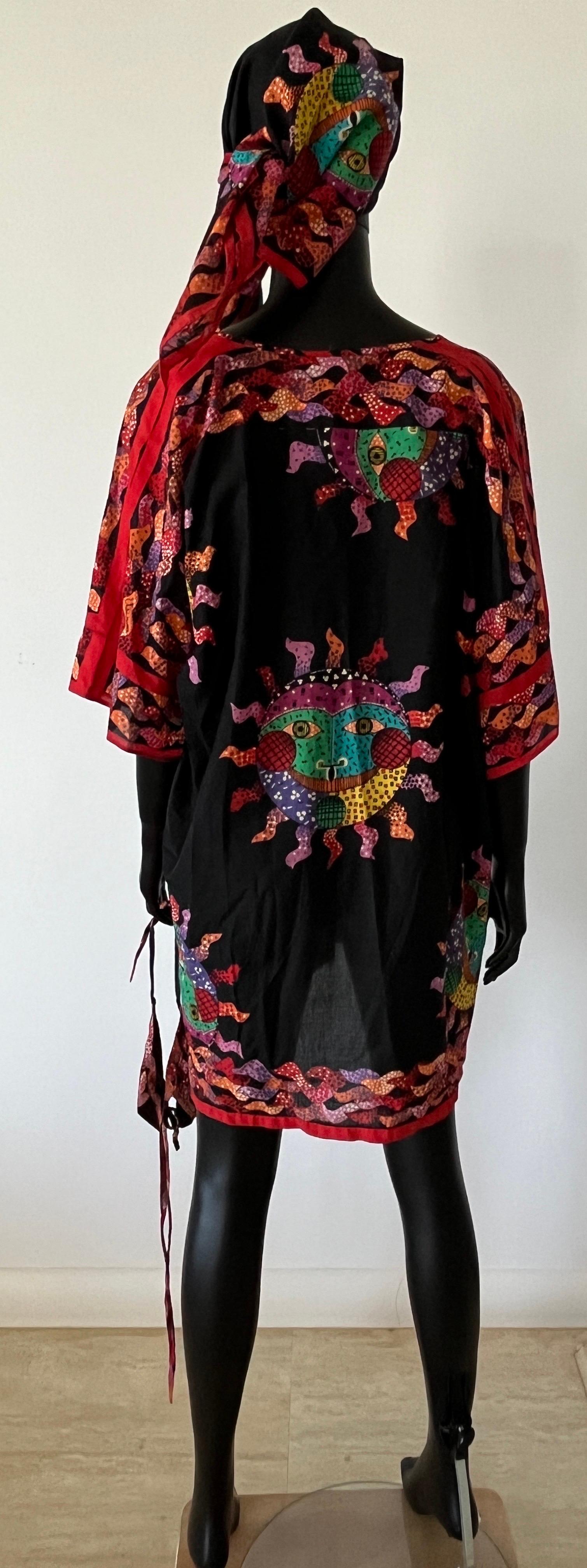 Vintage 1970's Valditeverre kaftan set, including a bikini top, square scarf and kaftan.

The kaftan is printed with a unique print that runs through the whole set and is the ultimate 70's resort piece, with split sleeve detail that shows at the top