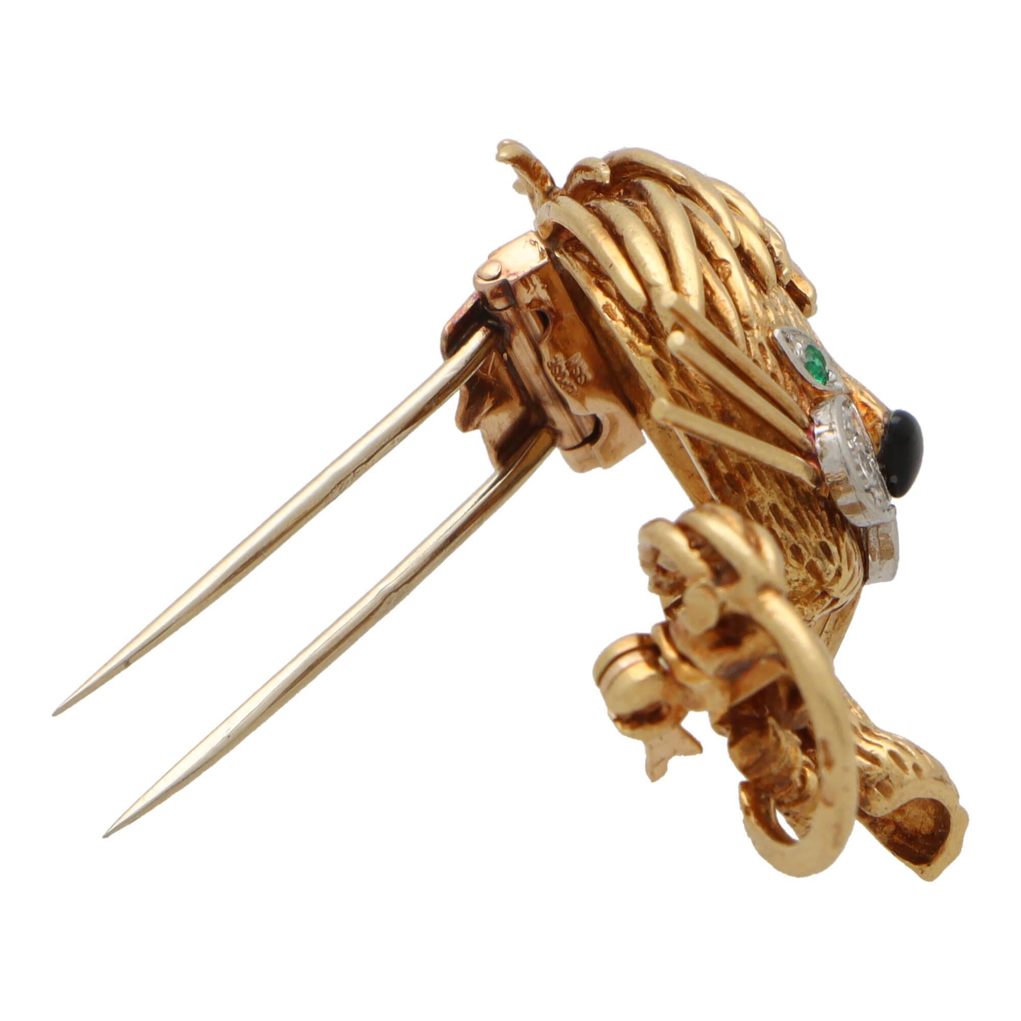 A beautiful vintage Van Cleef and Arpels 1970’s lion brooch in 18k yellow gold and platinum.

Known as the ‘Lion Ebouriffe’ brooch, the piece depicts a sitting lion, handmade in yellow gold and platinum. The lion has been beautifully handcrafted and
