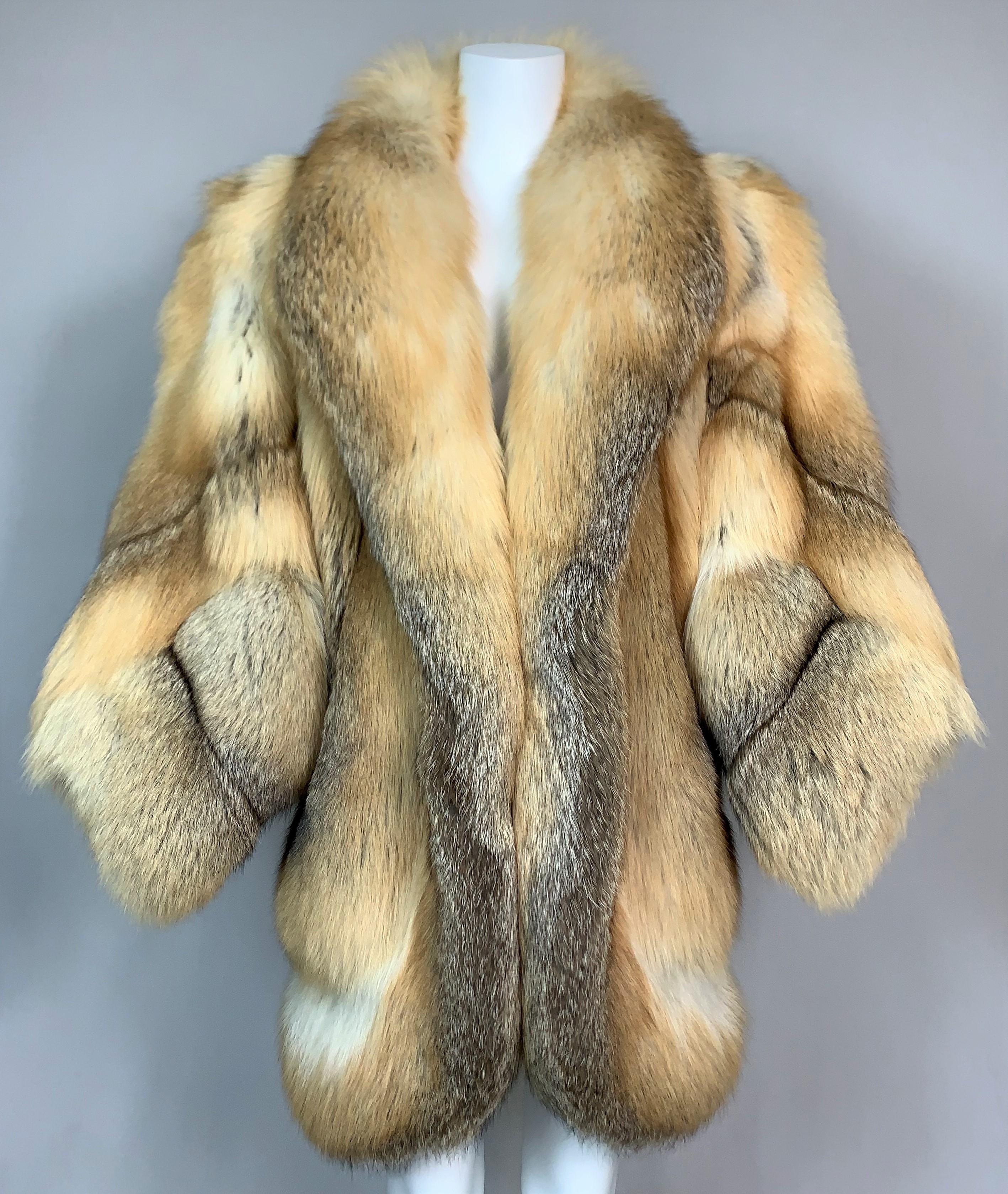 DESIGNER: 1970's Yves Saint Laurent

Please contact us for more images and/or information.

CONDITION: Good- no flaws- faint shedding on lining

FABRIC: Fox fur- single hook closure with hidden slit pockets

COUNTRY: France

SIZE:
