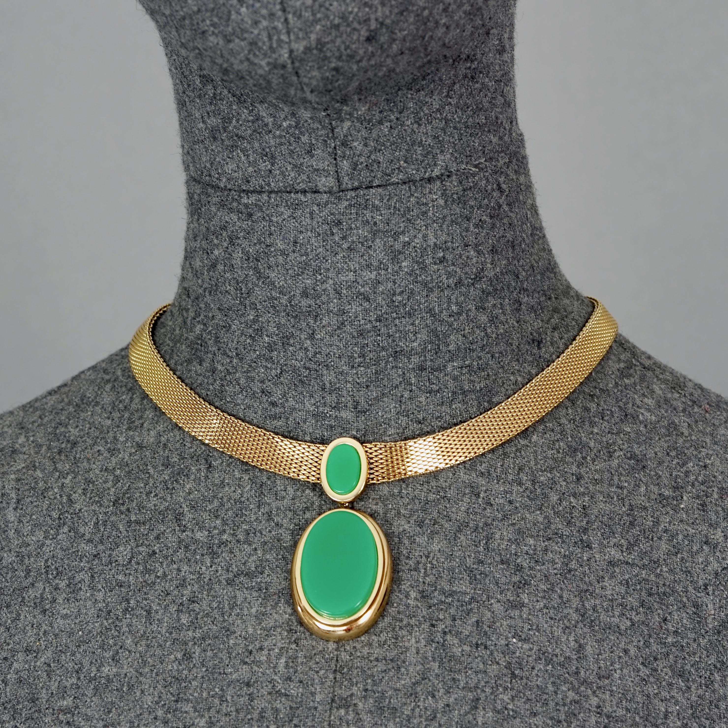 Vintage 1971 CHRISTIAN DIOR Double Oval Green Pendant Chain Necklace

Measurements:
Pendant Height: 2.36 inches (6 cm)
Wearable Length: 15.94 inches until 18.70 inches (40.5 cm until 47.5 cm)

Features:
- 100% Authentic CHRISTIAN DIOR.
- Flat chain