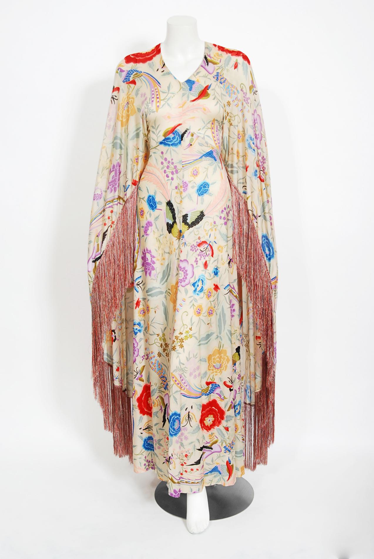 Breathtaking Missoni Couture documented iconic cream floral bird garden print caftan gown from their 1971 iconic collection. Redefining an entire genre of fashion, the 1970's were seen as Missoni's launch to fame as the bohemian chic trends