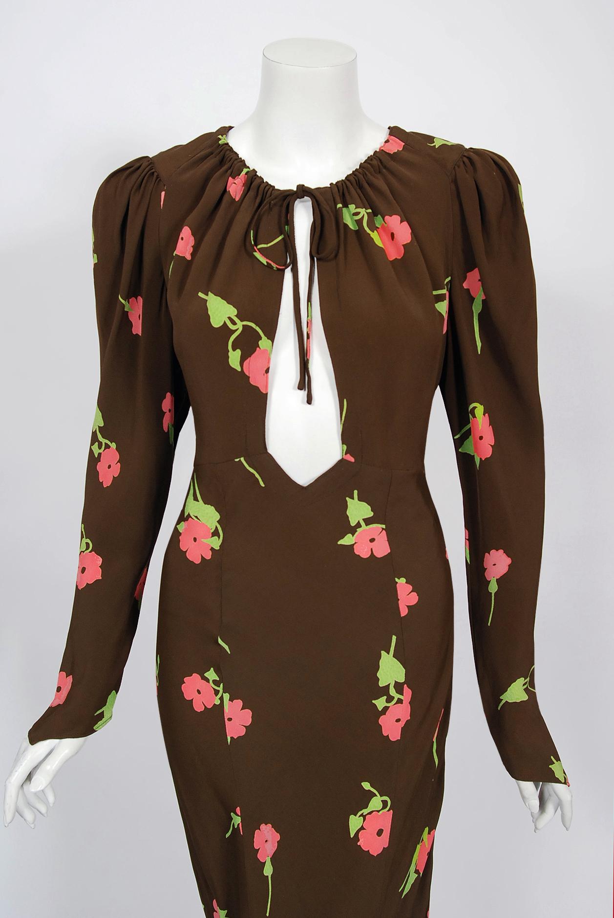 An extremely rare Ossie Clark for Quorum brown rayon crepe bias-cut gown dating back to his 1972 collection. English fashion designer, Raymond Ossie Clark, was a leading light in the London swinging sixties fashion era and is now renowned for his