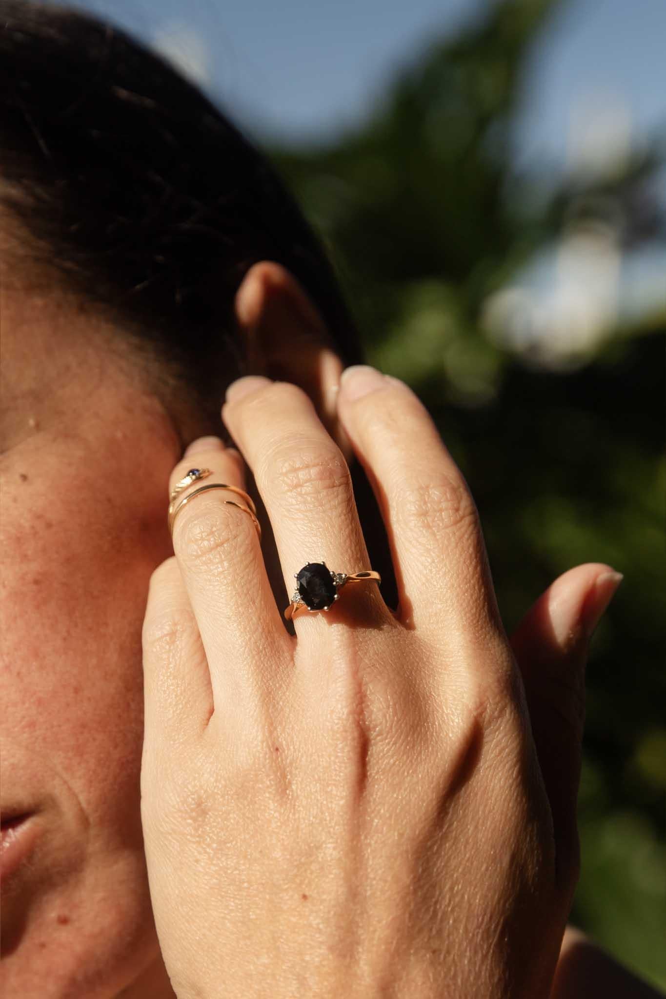 Crafted in 18 carat gold, our Kayla Ring is an exquisite beauty.  Her lush green teal sapphire is raised to welcome the light and rests in the embrace of shimmering diamonds.  She will be the perfect way to say 'I love you forever and always'.
 
The