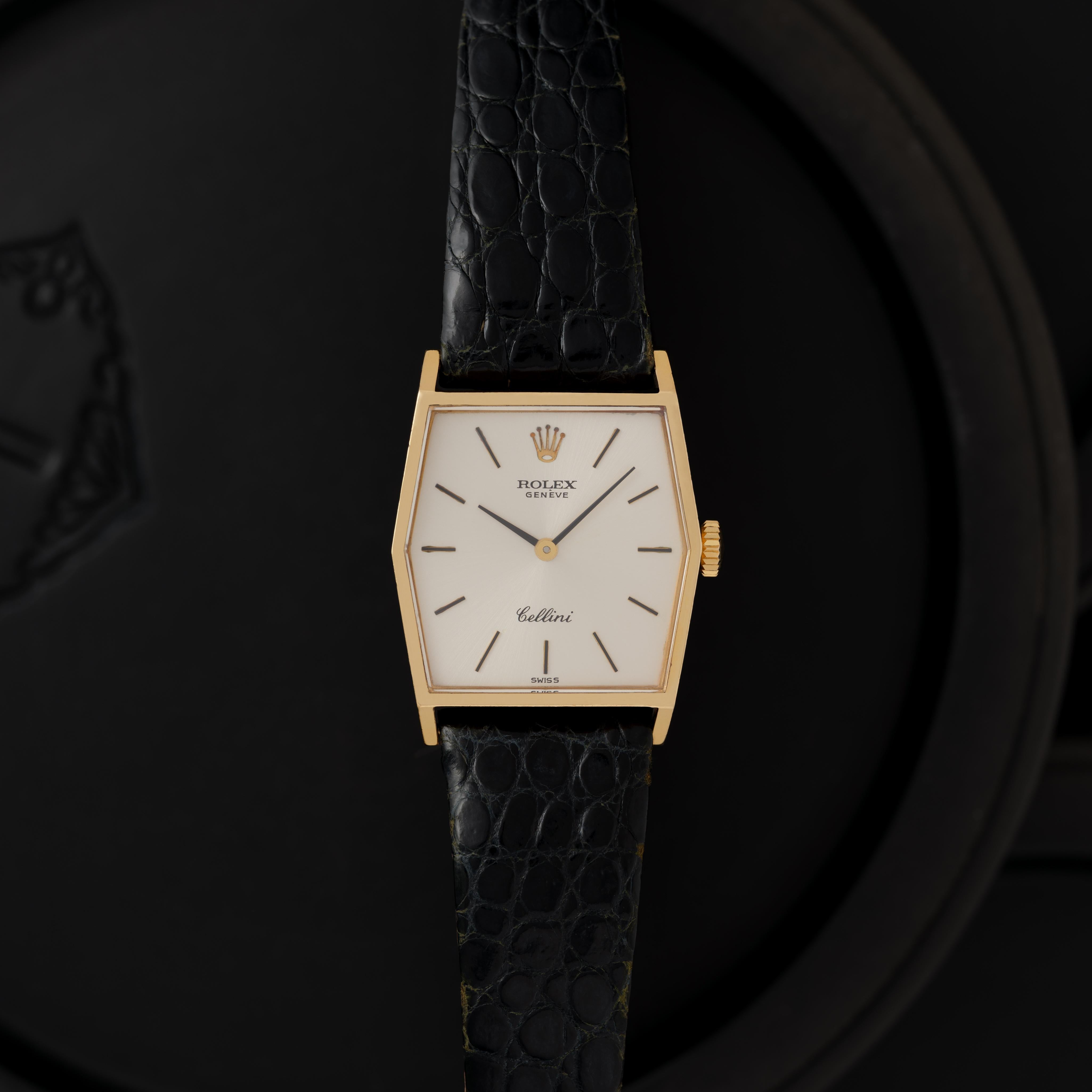 Vintage Rolex Cellini Model 4121 18k Yellow Gold 29mm x 33mm Silver Dial on Leather strap, Manual Movement, Made in Switzerland c.1976 with box and papers

Maker: Rolex
Model: Cellini 4121
Year: 1976
Material: 18k Yellow Gold
Dial: Silver
Case