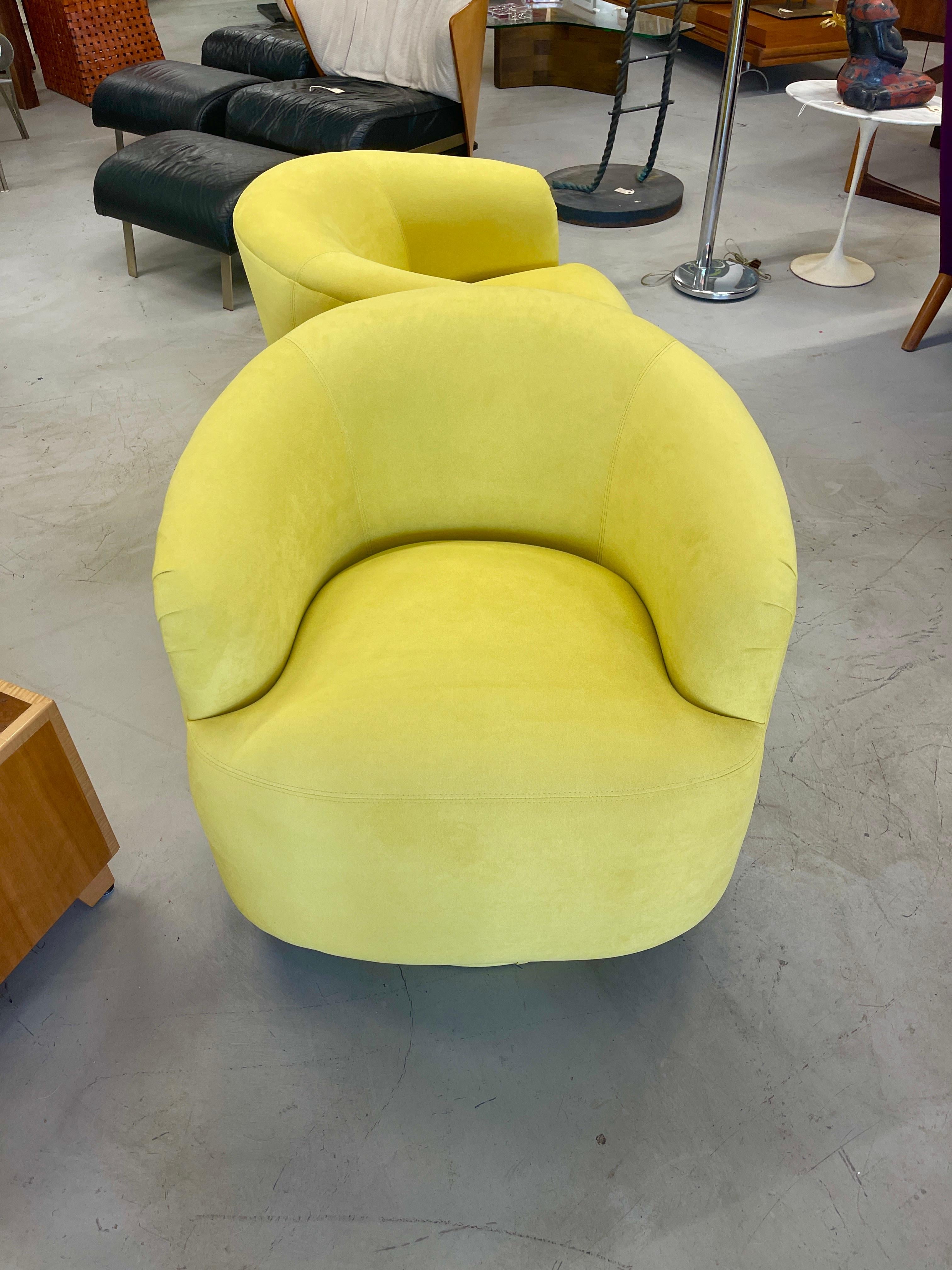 A lovely pair of vintage barrel swivel chairs we just have reupholstered in a Knoll ultra suede in a lemon yellow color called Ray. Very comfortable and great scale. The are approximately 30 wide and 28 inches deep. Seat height is approximately 19