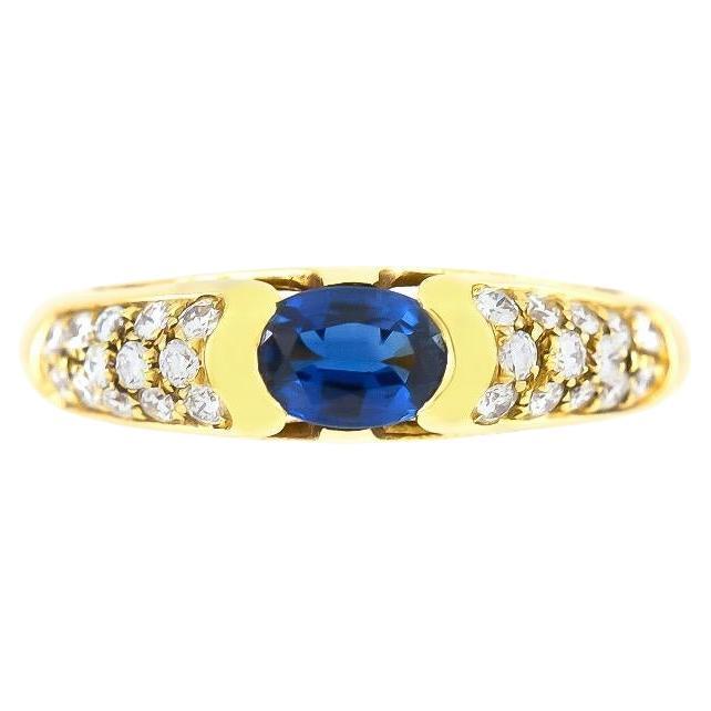 Vintage 1980s 0.70 Carat Oval Cut Sapphire Ring with Diamonds