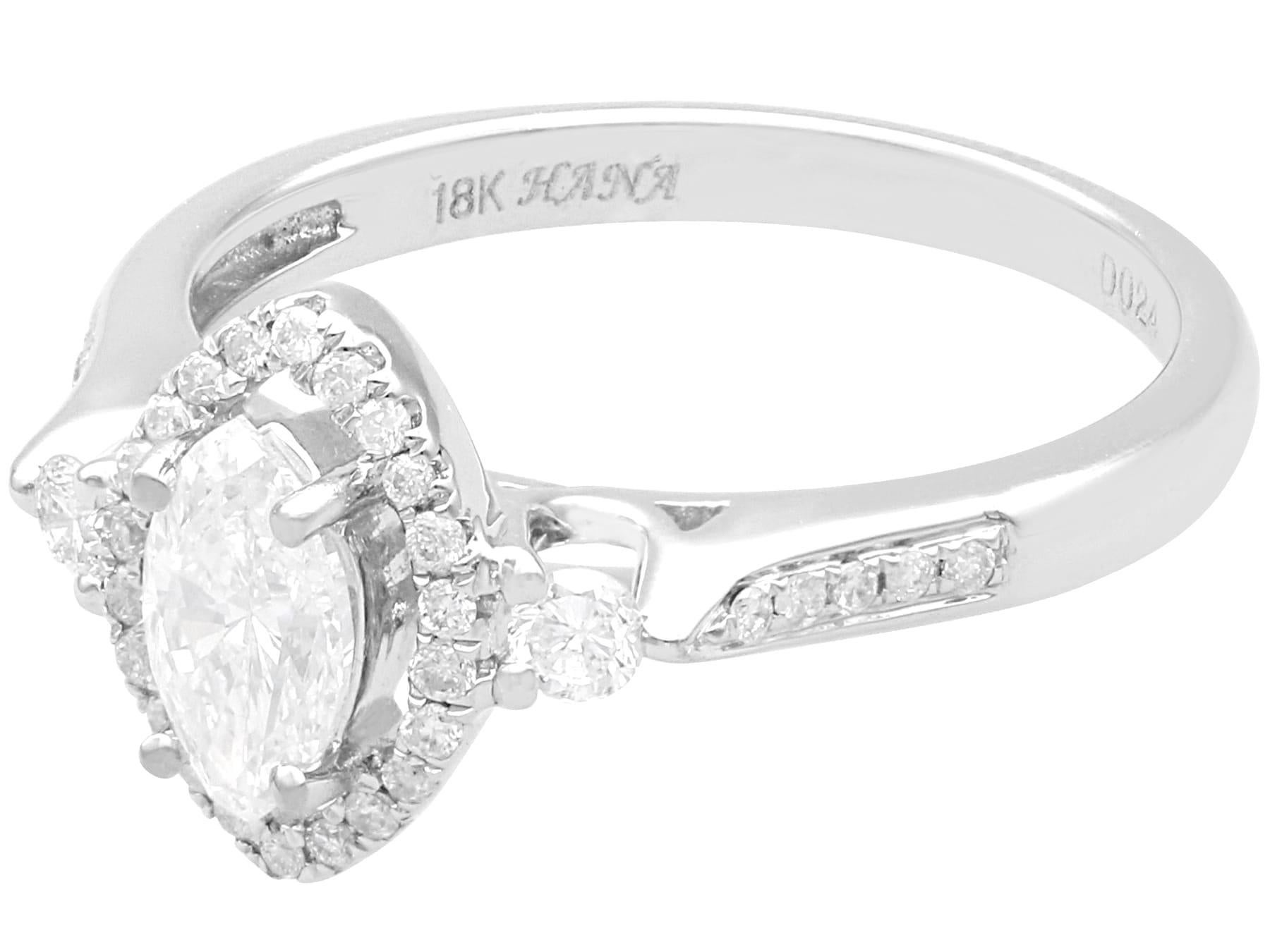 Marquise Cut 1980s 0.83 Carat Diamond and 18k White Gold Halo Ring For Sale