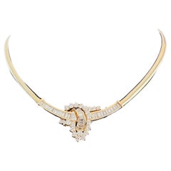 Vintage 1980's 14 karat yellow gold omega necklace with diamonds