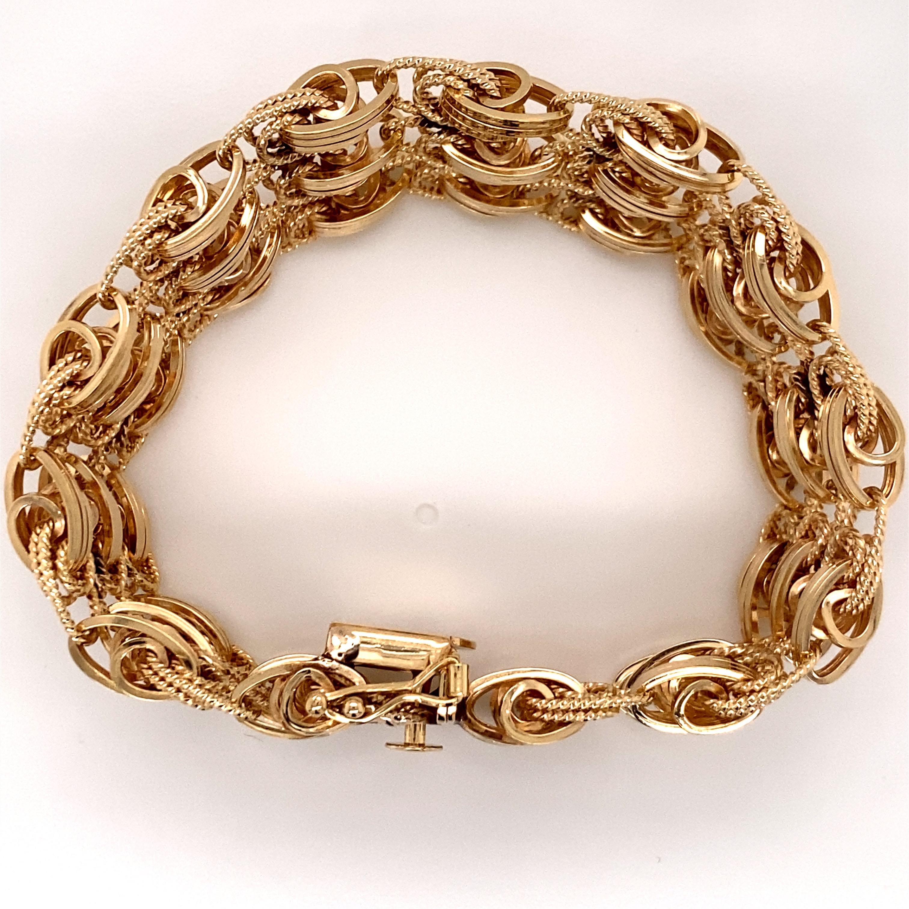 Modern Vintage 1980s 14 Karat Yellow Gold 3-Row Wide Link Bracelet For Sale